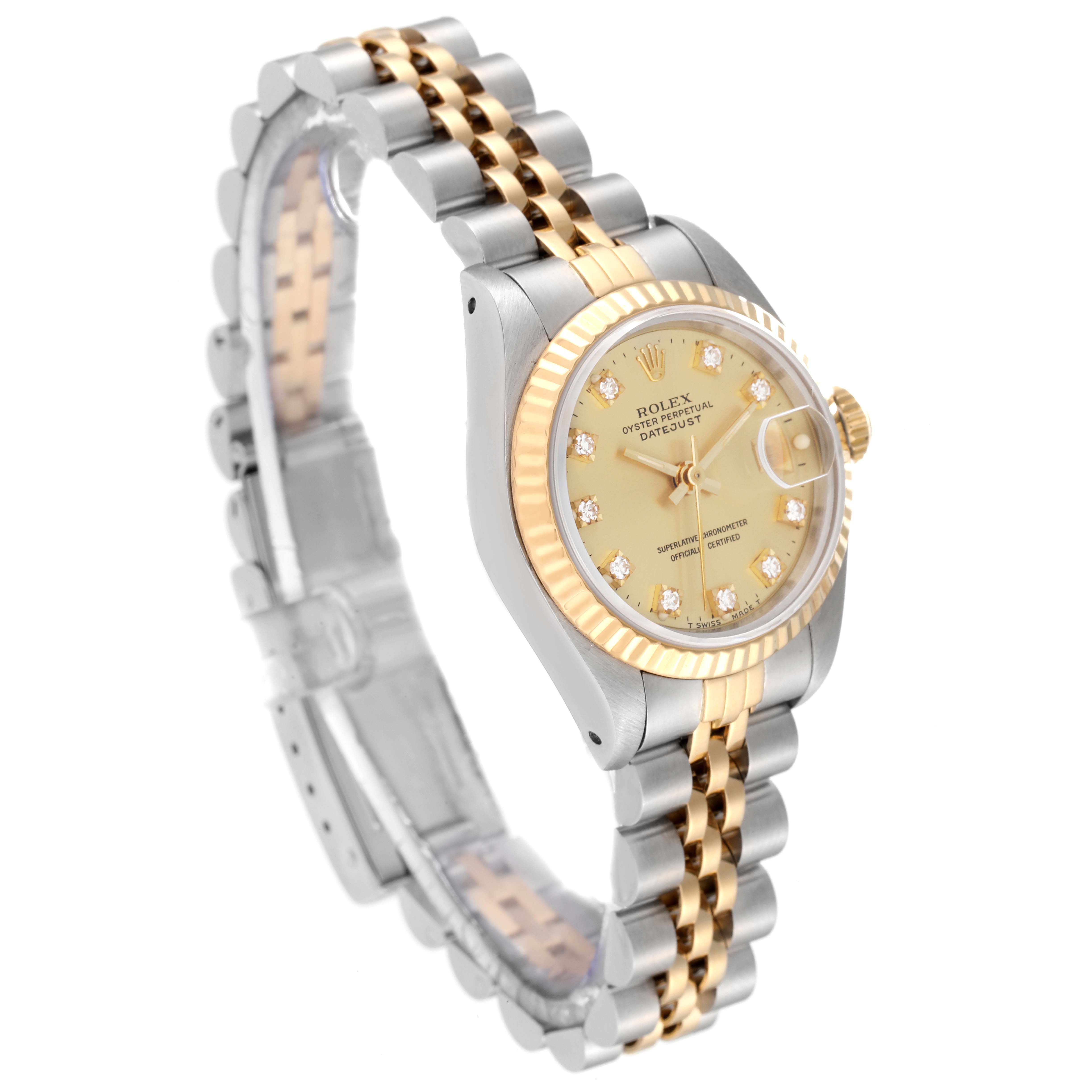 The image shows a Rolex Datejust 69173 Women's Steel and Gold (two tone) Champagne Dial 69173 Women's Steel and Gold (two tone) Champagne Dial watch angled from the front left, highlighting its gold bezel, champagne dial, and two-tone bracelet.