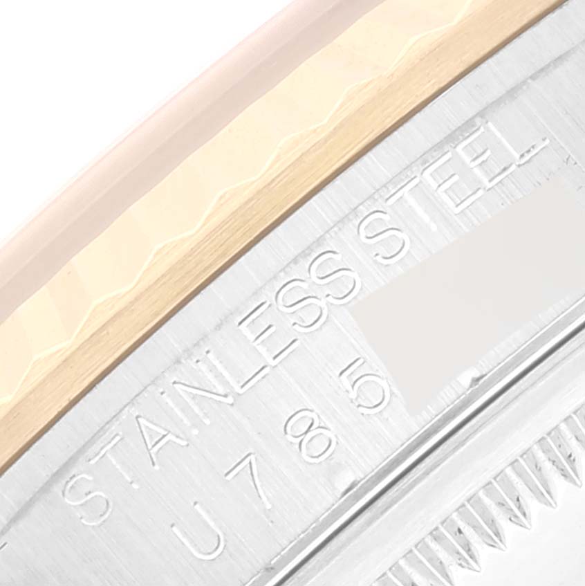 This image shows a close-up of the stainless steel case and part of the bezel of the Rolex Datejust 16233 Men's Steel and Gold (two tone) White Dial 16233 Men's Steel and Gold (two tone) White Dial watch.