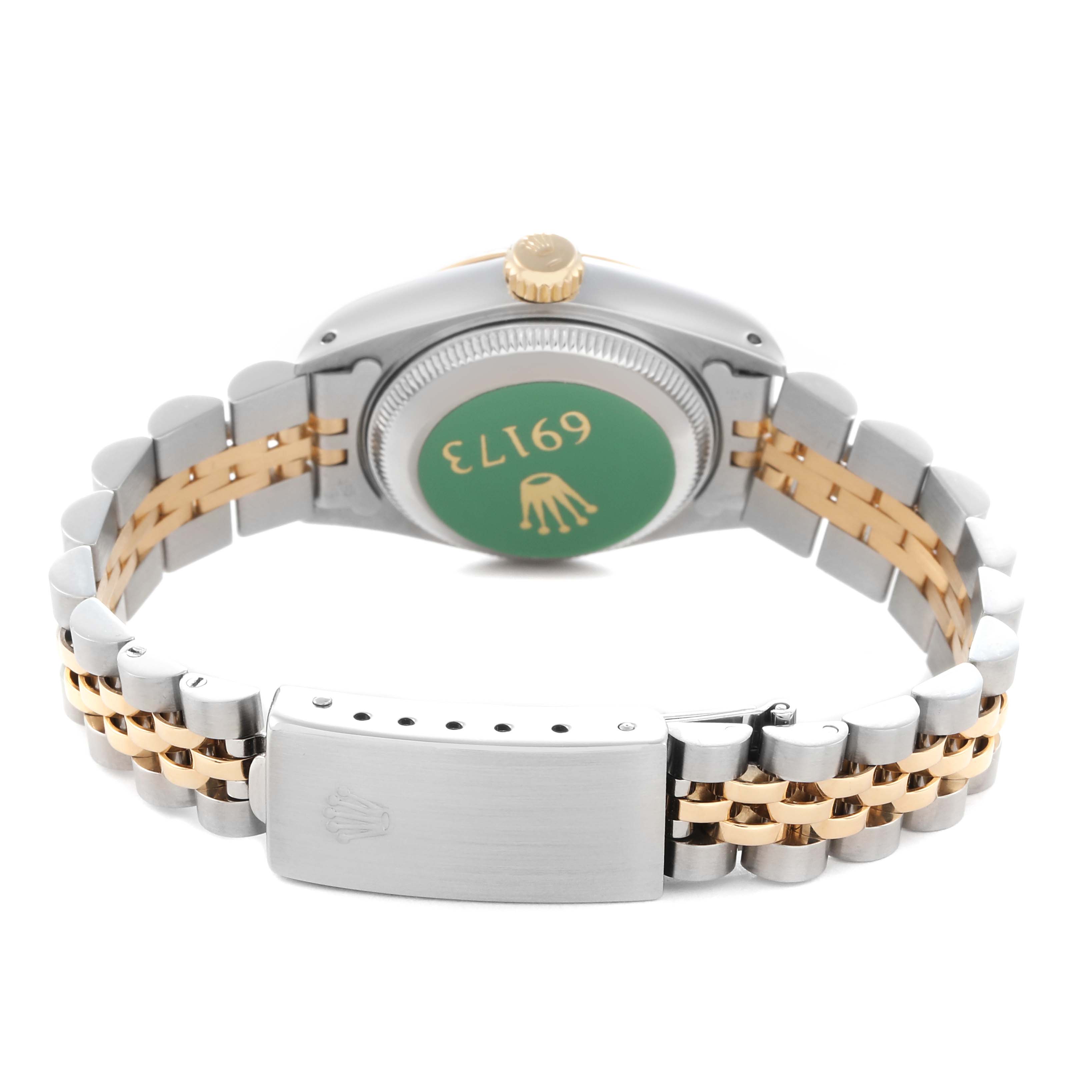 The image shows the back of a Rolex Datejust 69173 Women
s Steel and Gold (two tone) White Dial 69173 Women
s Steel and Gold (two tone) White Dial watch, highlighting the caseback, crown, and two-tone bracelet with clasp.