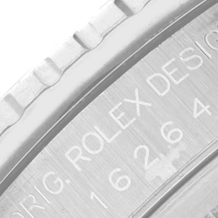This close-up image shows the bezel and part of the engraved casing of the Rolex Turn-o-Graph 16264 Men's Stainless Steel Black Dial 16264 Men's Stainless Steel Black Dial watch.