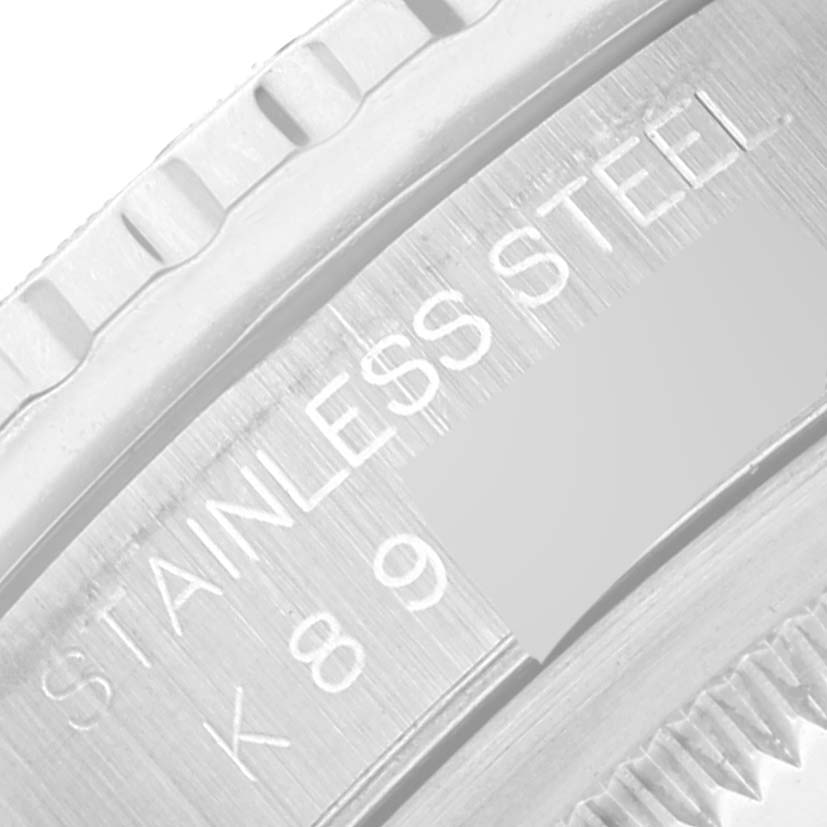 This image shows a close-up of the case back and bezel of a Rolex Turn-o-Graph 16264 Men's Stainless Steel Black Dial 16264 Men's Stainless Steel Black Dial watch, revealing the stainless steel engraving.