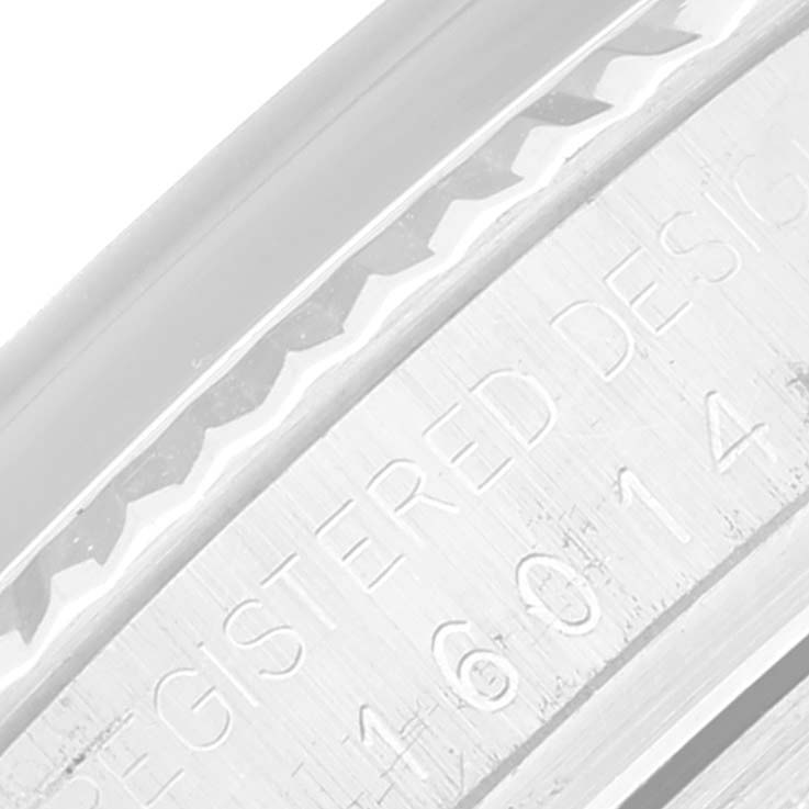 This is a close-up image showing the engraved model number and edge detailing of a Rolex Datejust 16014 Men's Stainless Steel Black Dial 16014 Men's Stainless Steel Black Dial watch.