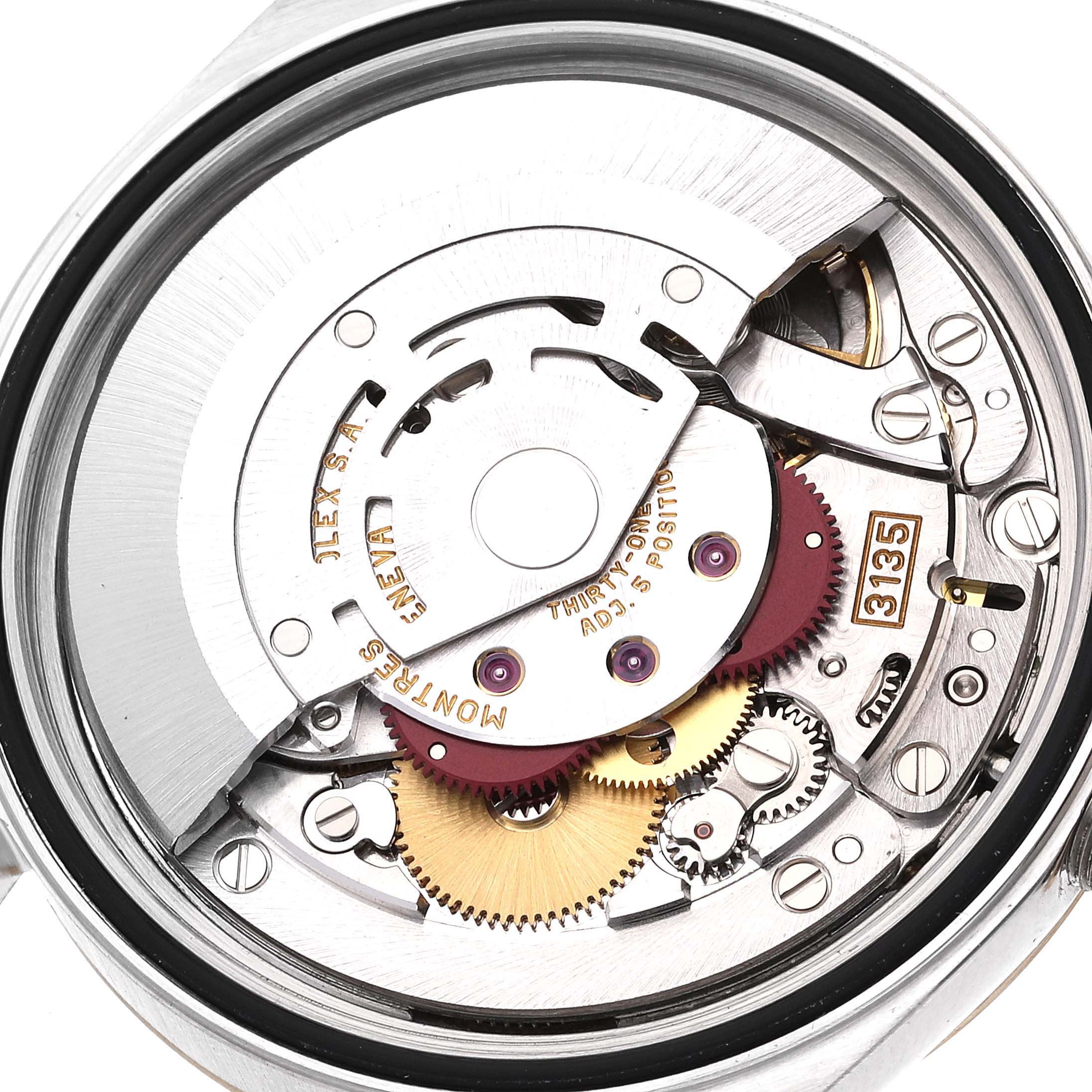 This image displays the intricate internal mechanics of a Rolex Datejust 16233 Men's Steel and Gold (two tone) White Dial 16233 Men's Steel and Gold (two tone) White Dial watch from a top-down angle, highlighting its movement components.