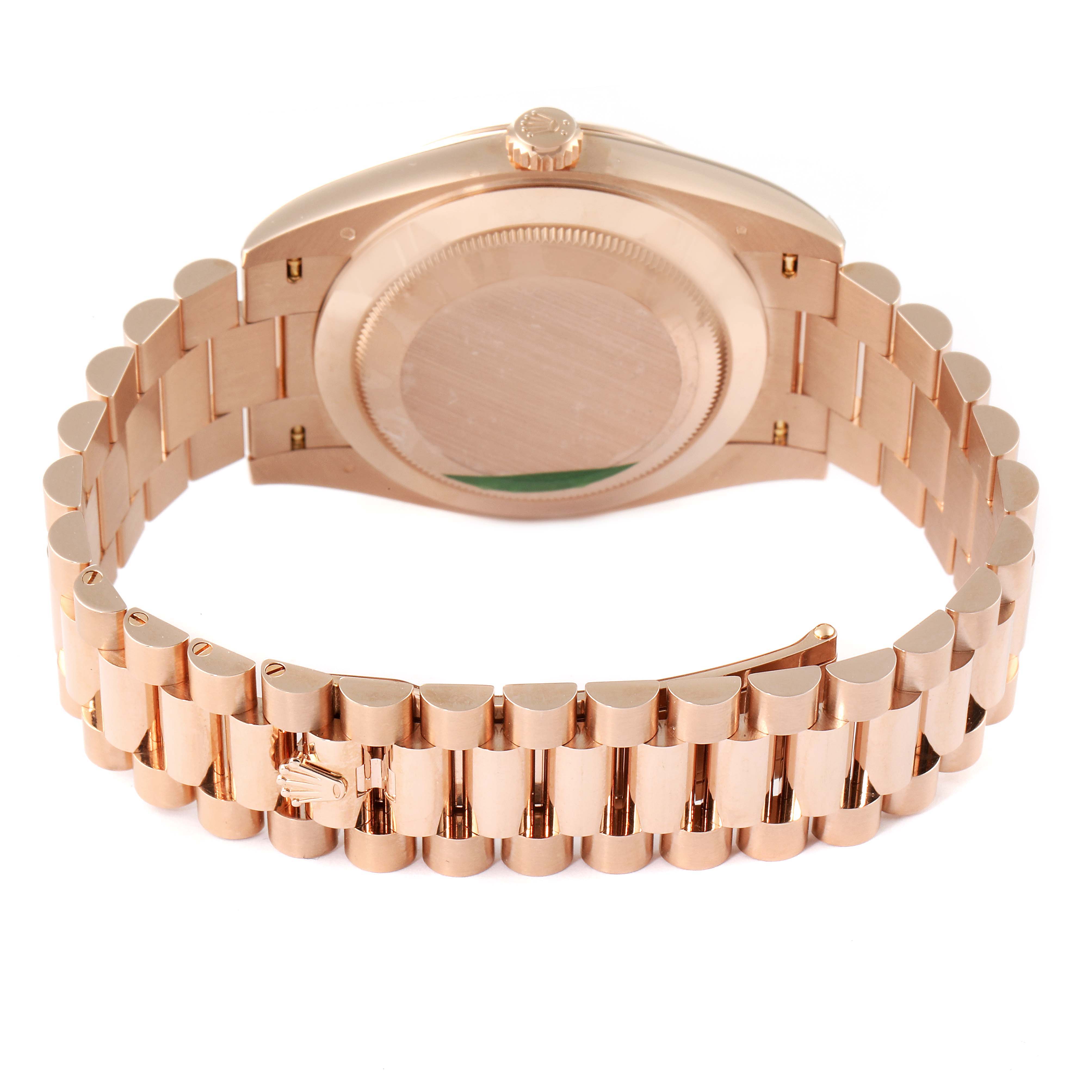 The image shows the back case and President bracelet of a Rolex President 228235 Men's Rose Gold Pink Dial 228235 Men's Rose Gold Pink Dial model watch from a rear angle.
