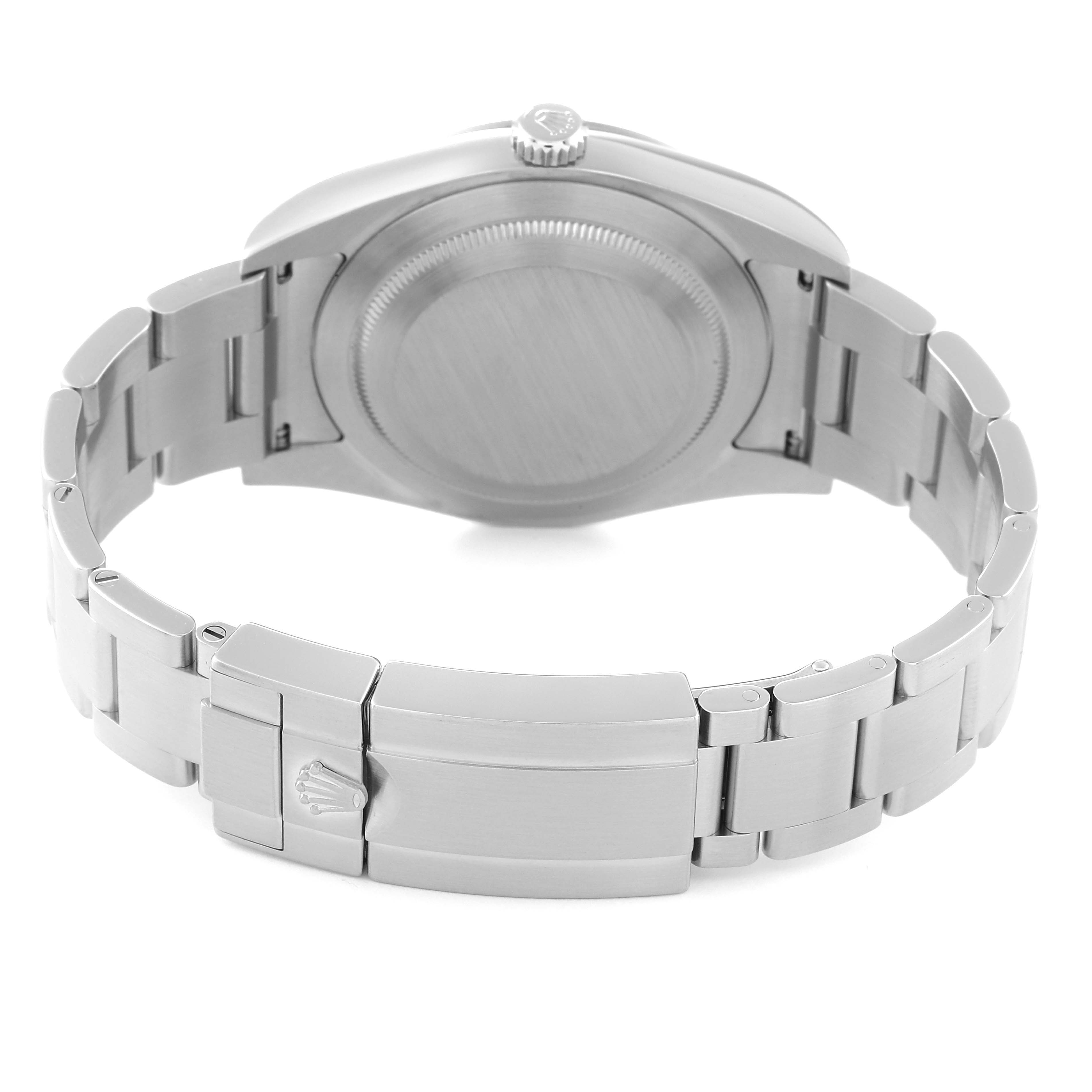 The image shows the backside and clasp of a Rolex Explorer 214270 Men
s Stainless Steel Black Dial 214270 Men
s Stainless Steel Black Dial model watch.