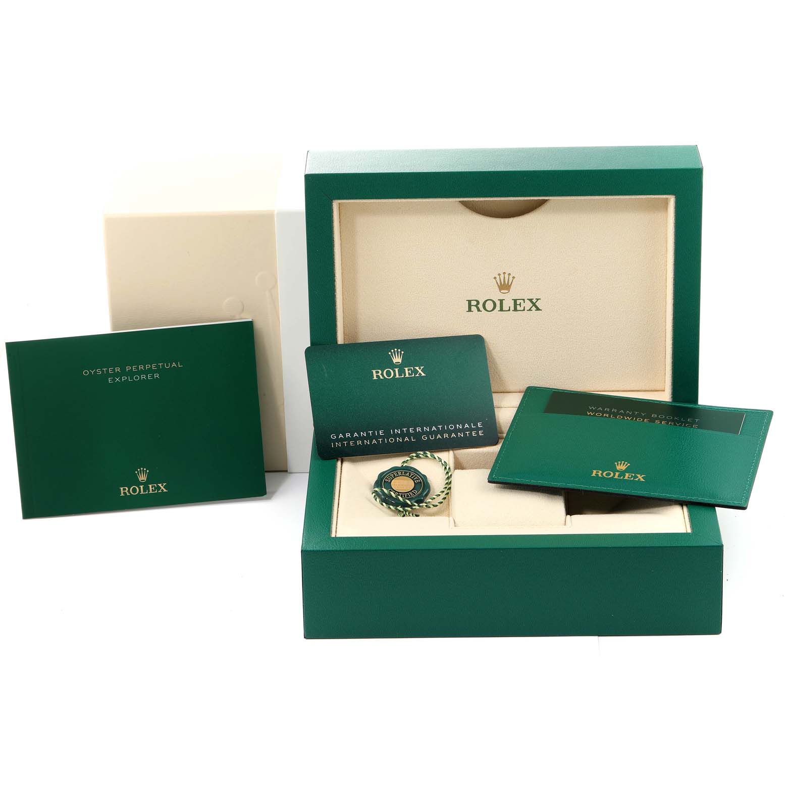 The image shows the packaging and accessories for a Rolex Explorer 124270 Men's Stainless Steel Black Dial 124270 Men's Stainless Steel Black Dial watch, including a box, booklets, and warranty card.