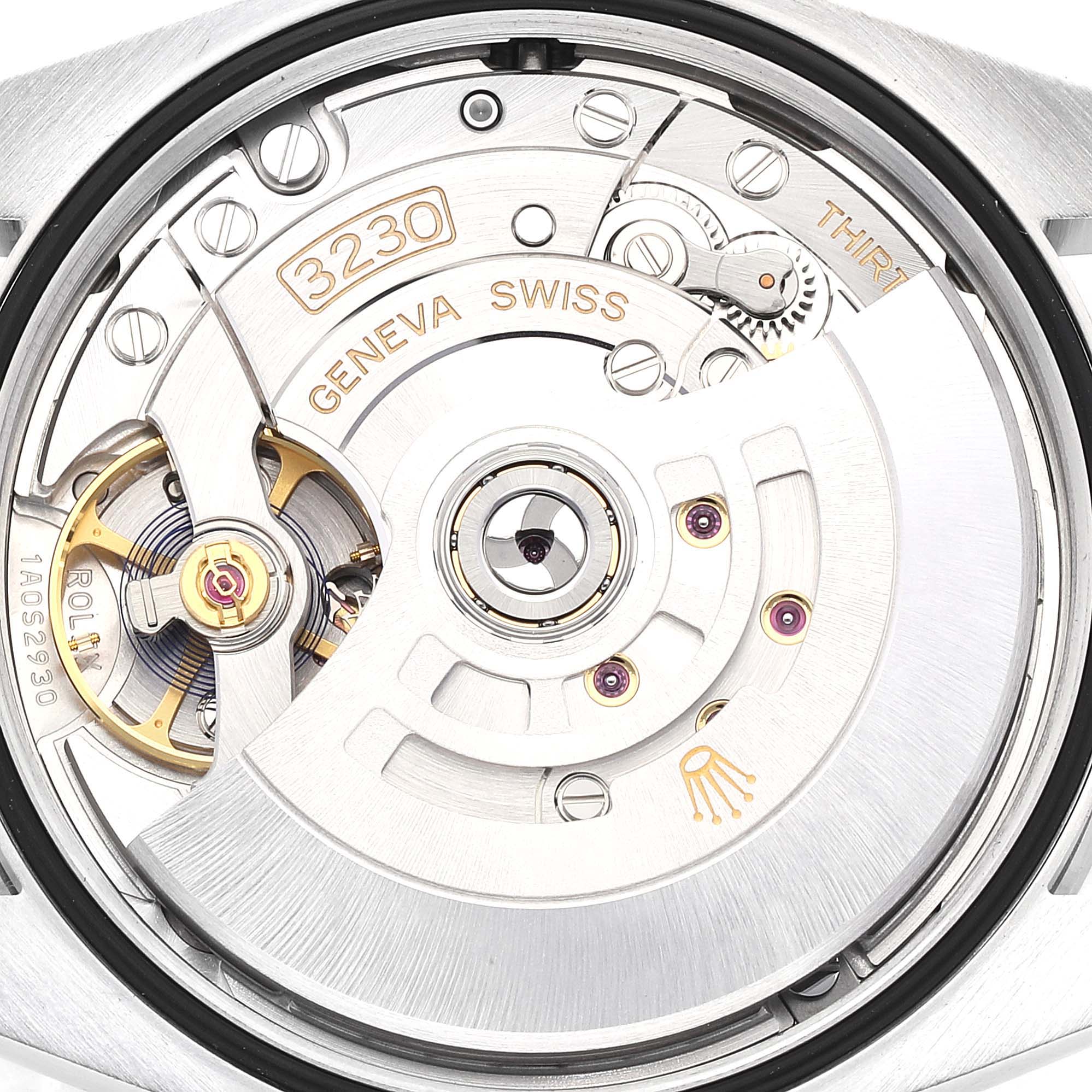 The image shows a close-up of the movement inside a Rolex Explorer 124270 Men's Stainless Steel Black Dial 124270 Men's Stainless Steel Black Dial watch, focusing on the intricate mechanical components.