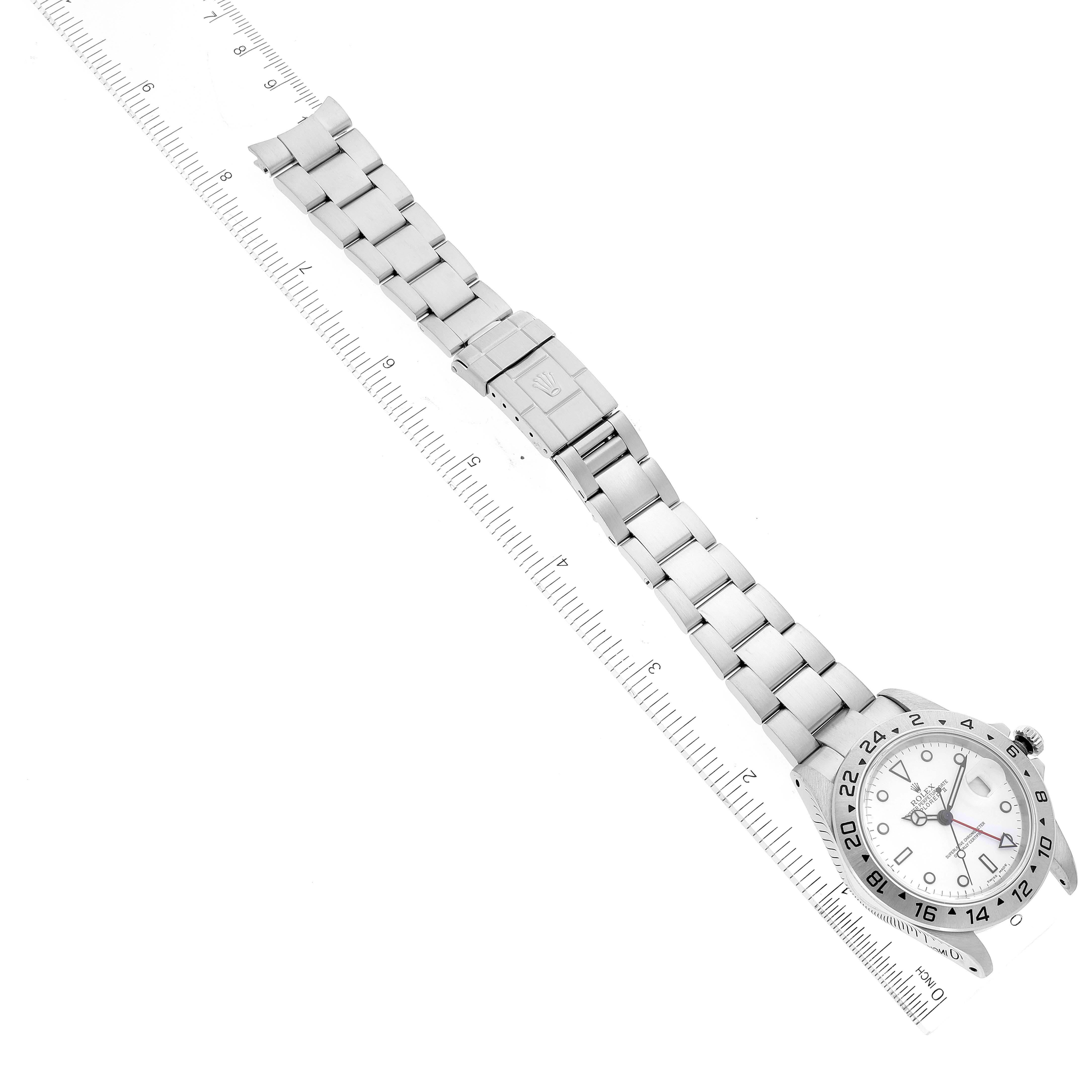 The image shows a top-down view of a Rolex Explorer 16570 Men's Stainless Steel White Dial 16570 Men's Stainless Steel White Dial watch, highlighting the full bracelet, clasp, and face.