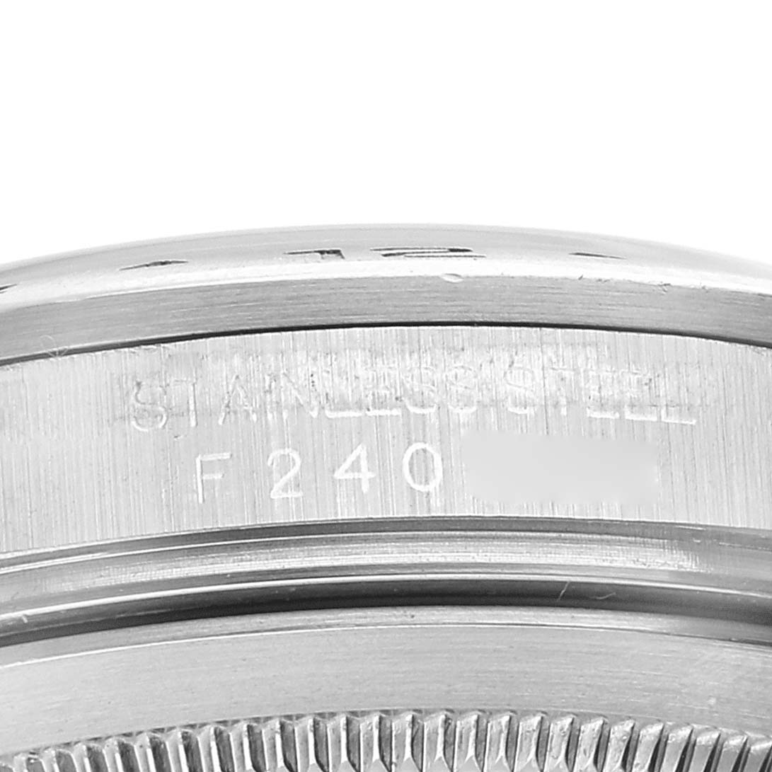 The image shows a close-up of the case back and serial number of a Rolex Explorer 16570 Men
s Stainless Steel Black Dial 16570 Men
s Stainless Steel Black Dial watch.