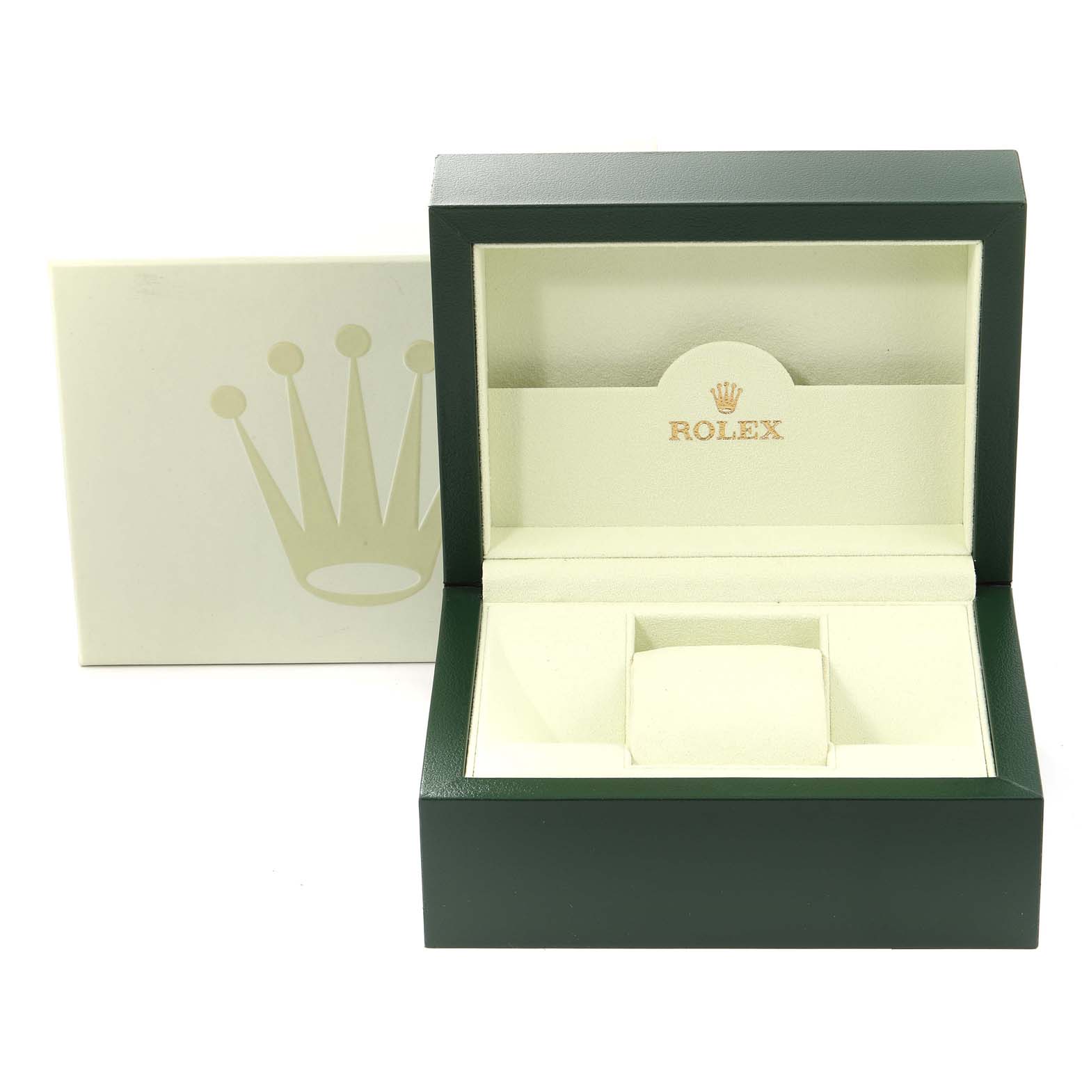 The image shows an open Rolex box for the Explorer model, featuring its green and cream-colored interior and branded logo.