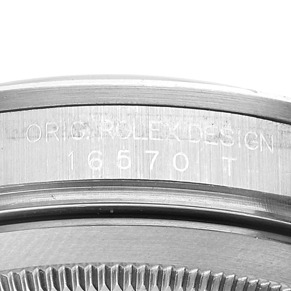 This close-up image shows the engraved side and bezel of the Rolex Explorer 16570 Men
s Stainless Steel Black Dial 16570 Men
s Stainless Steel Black Dial model 16570T.
