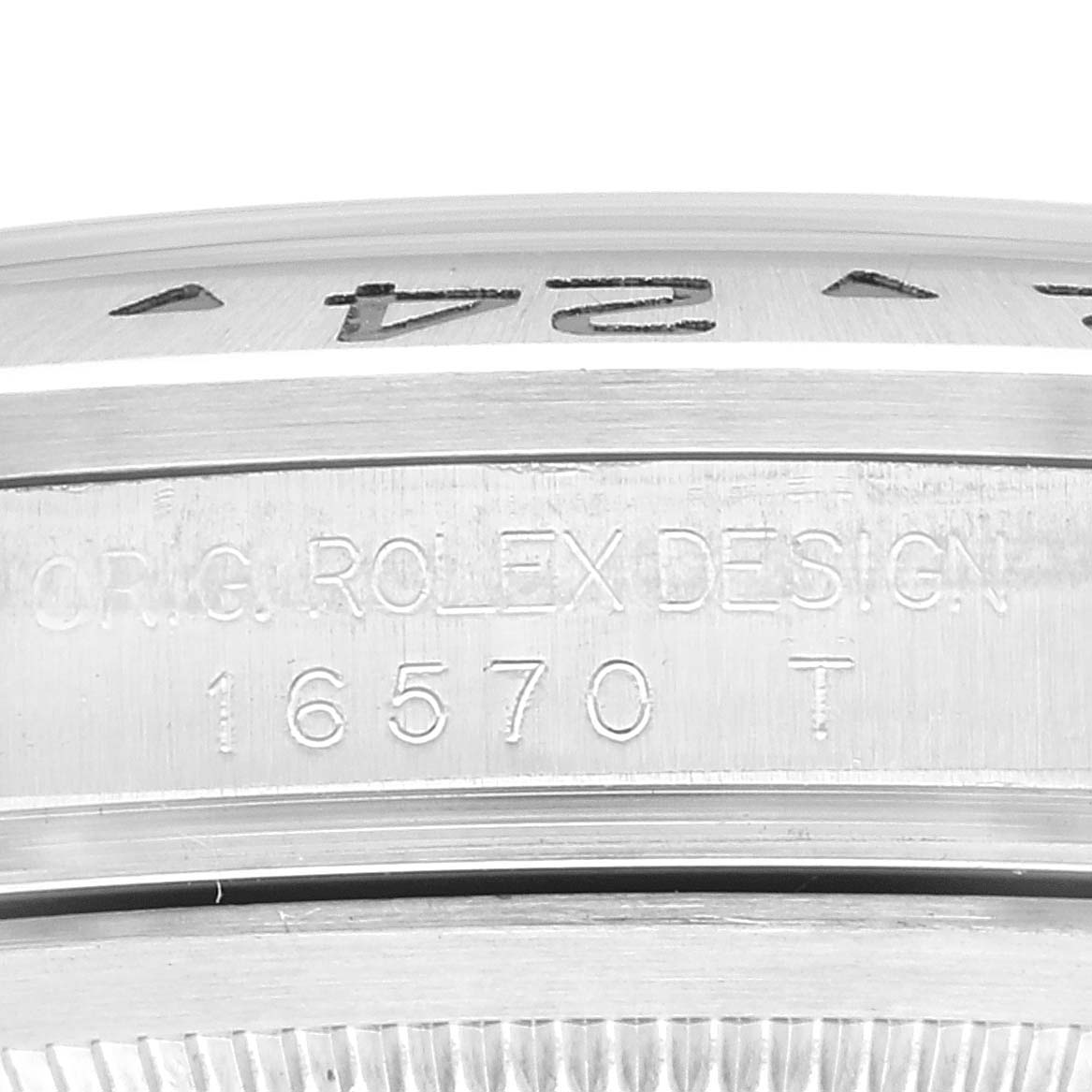 The image shows a close-up view of the case side inscription on a Rolex Explorer 16570 Men
s Stainless Steel Black Dial 16570 Men
s Stainless Steel Black Dial model 16570 T.