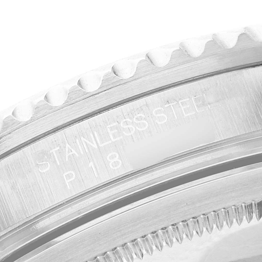 This close-up angle shows the stainless steel bezel and caseback edge of a Rolex GMT-Master 16710 Men's Stainless Steel Black Dial 16710 Men's Stainless Steel Black Dial watch.