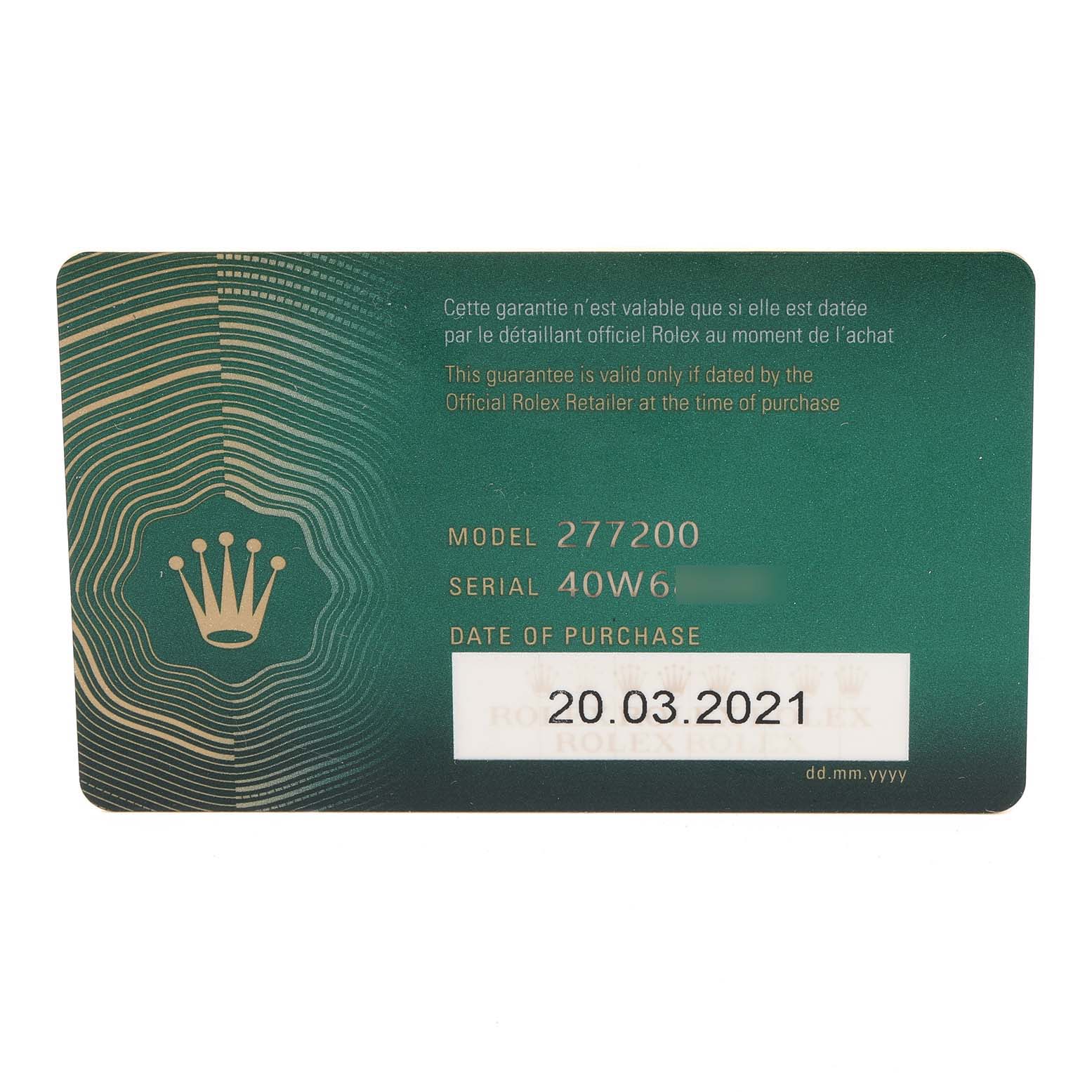 The image is of the guarantee card for the Rolex Mid-Size 277200 Women
s Stainless Steel Blue Dial 277200 Women
s Stainless Steel Blue Dial model 277200, showing the serial number and date of purchase.