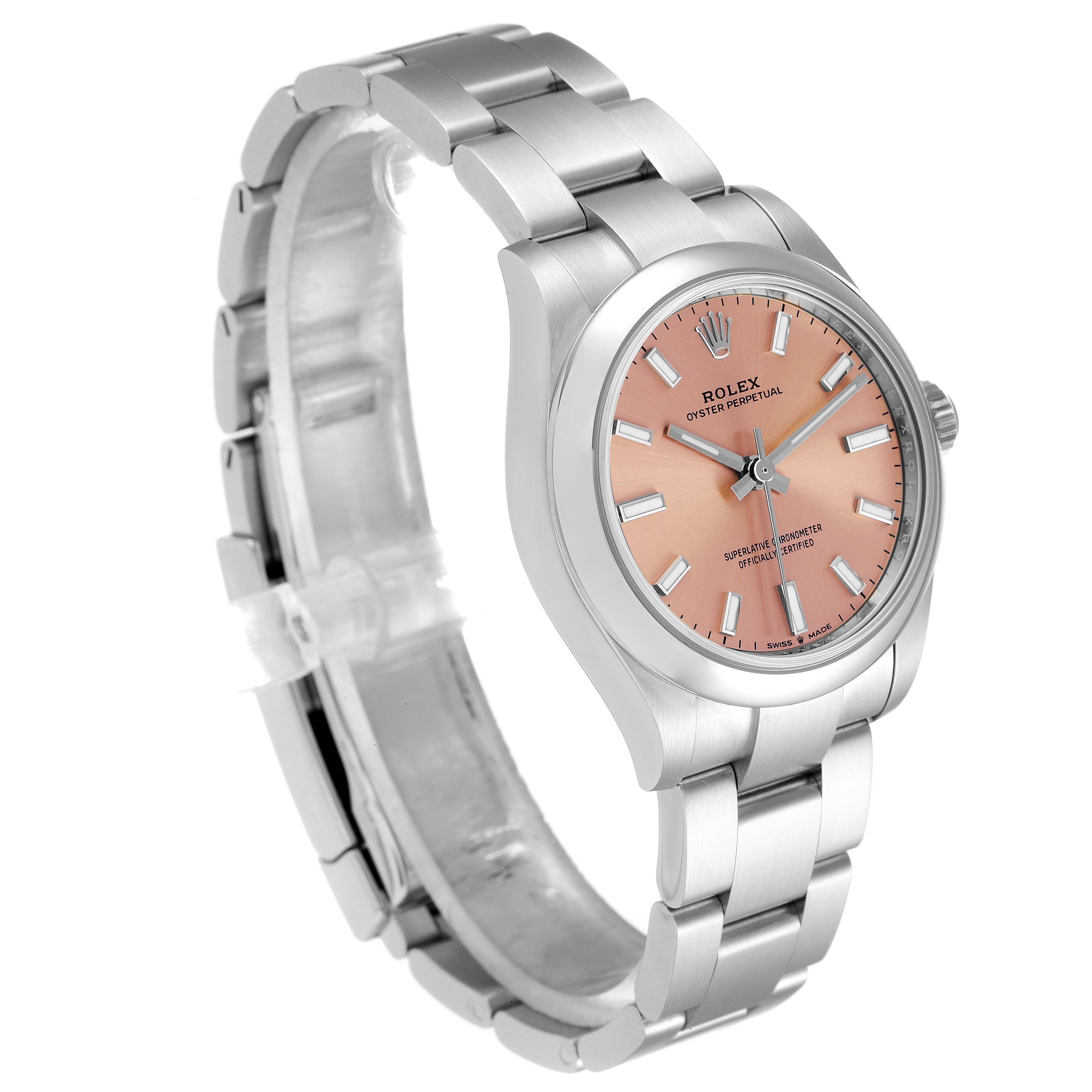 The Rolex Mid-Size 277200 Women
s Stainless Steel Pink Dial 277200 Women
s Stainless Steel Pink Dial watch is shown at a slight side angle, displaying its face, bezel, and metal bracelet.