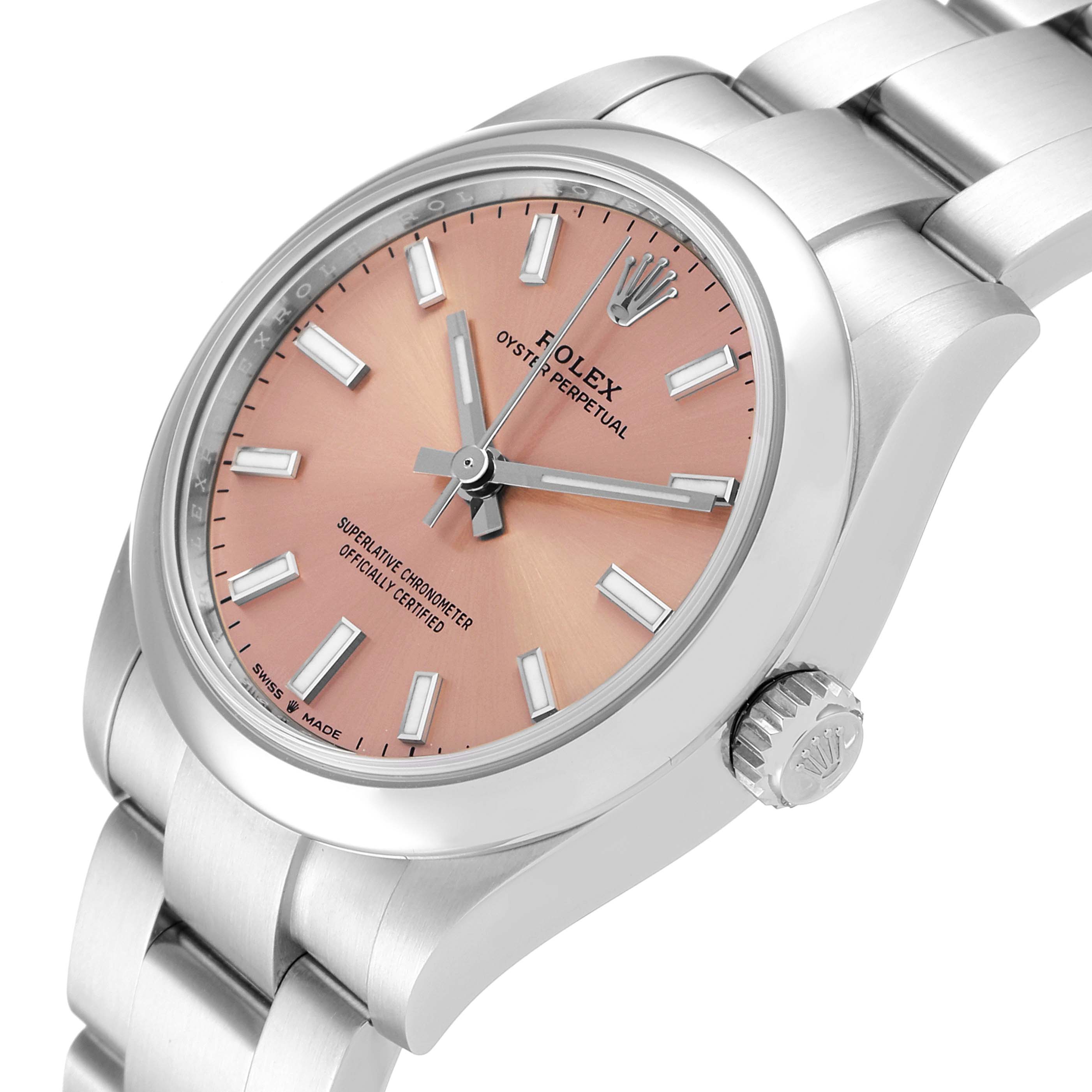 This image shows a close-up angled view of a Rolex Oyster Perpetual Mid-Size watch, highlighting the dial, crown, and bracelet.