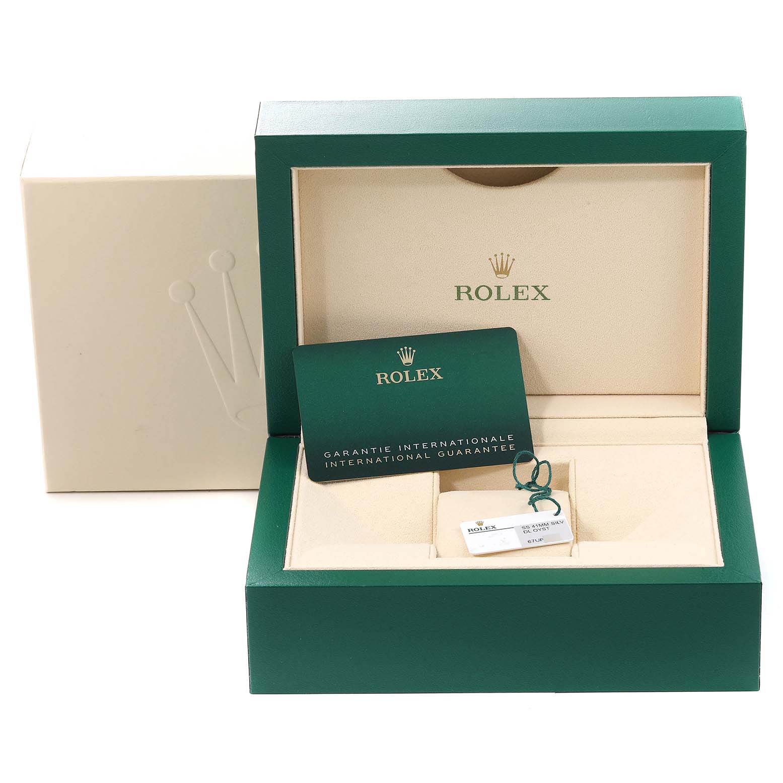 This image shows the box, international guarantee card, and accessories for a Rolex Oyster Perpetual 124300 Men's Stainless Steel Silver Dial 124300 Men's Stainless Steel Silver Dial watch.