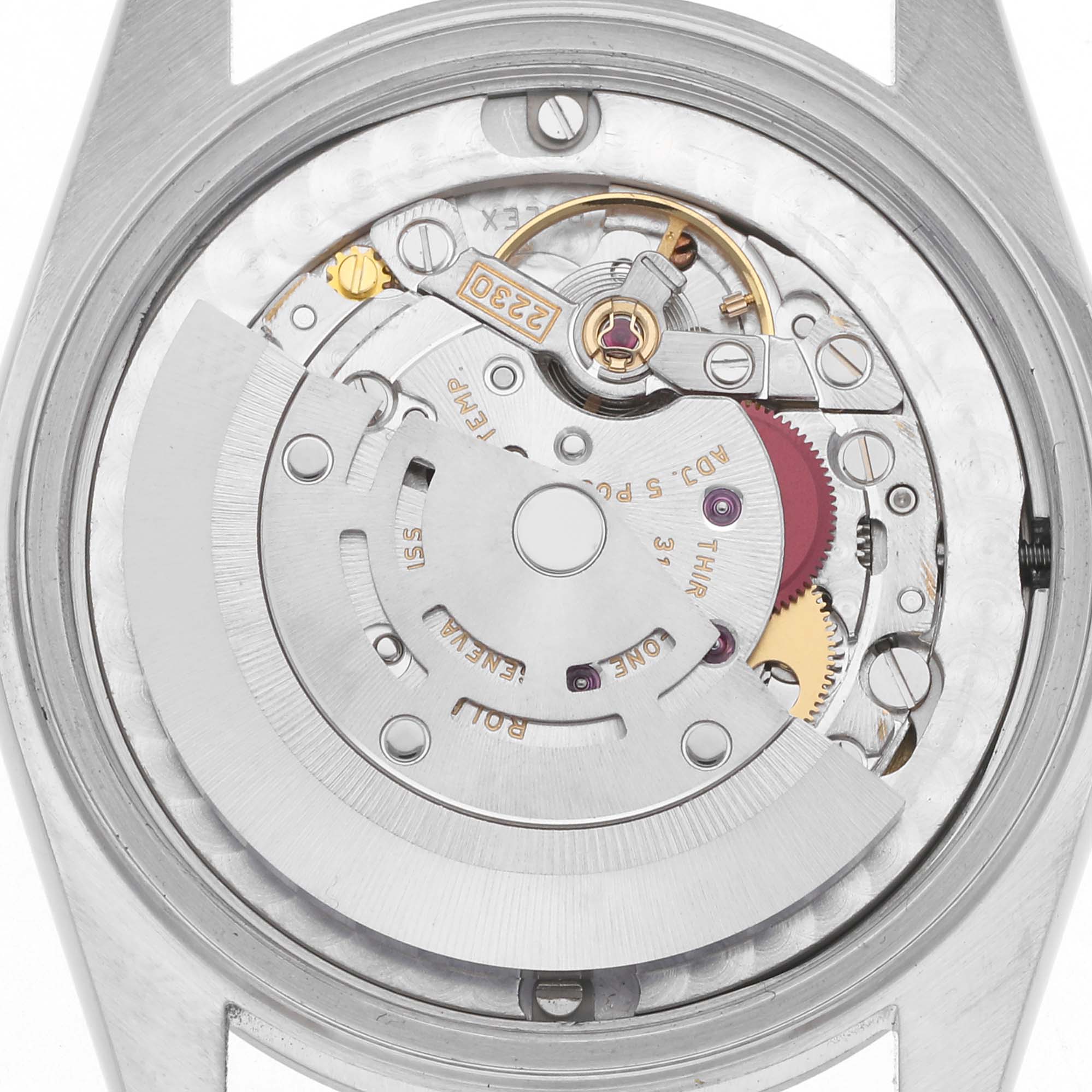 The image shows an overhead view of the movement mechanism of a Rolex Mid-Size 77080 Women
s Stainless Steel White Dial 77080 Women
s Stainless Steel White Dial watch.