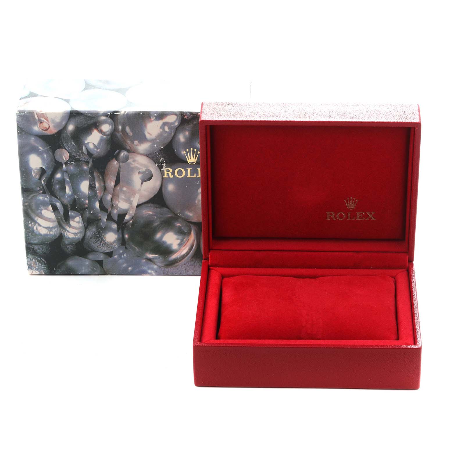 The image shows a red Rolex Oyster Perpetual 76193 Women
s Steel and Gold (two tone) Champagne Dial 76193 Women
s Steel and Gold (two tone) Champagne Dial watch box with the lid open, revealing a red cushion inside.