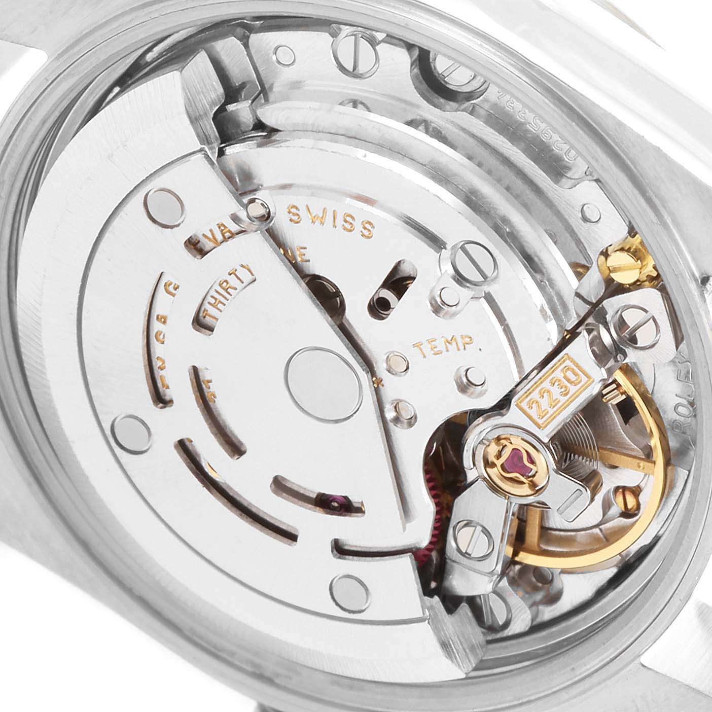 The image shows a close-up view of the movement mechanism of a Rolex Oyster Perpetual 76030 Women's Stainless Steel White Dial 76030 Women's Stainless Steel White Dial watch.