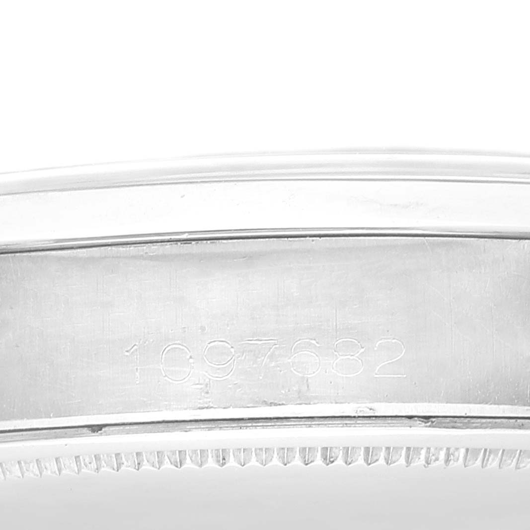 This image shows a close-up of the serial number engraved on the side of the case of the Rolex Vintage Collection 6694 Men's Stainless Steel Black Dial 6694 Men's Stainless Steel Black Dial watch.