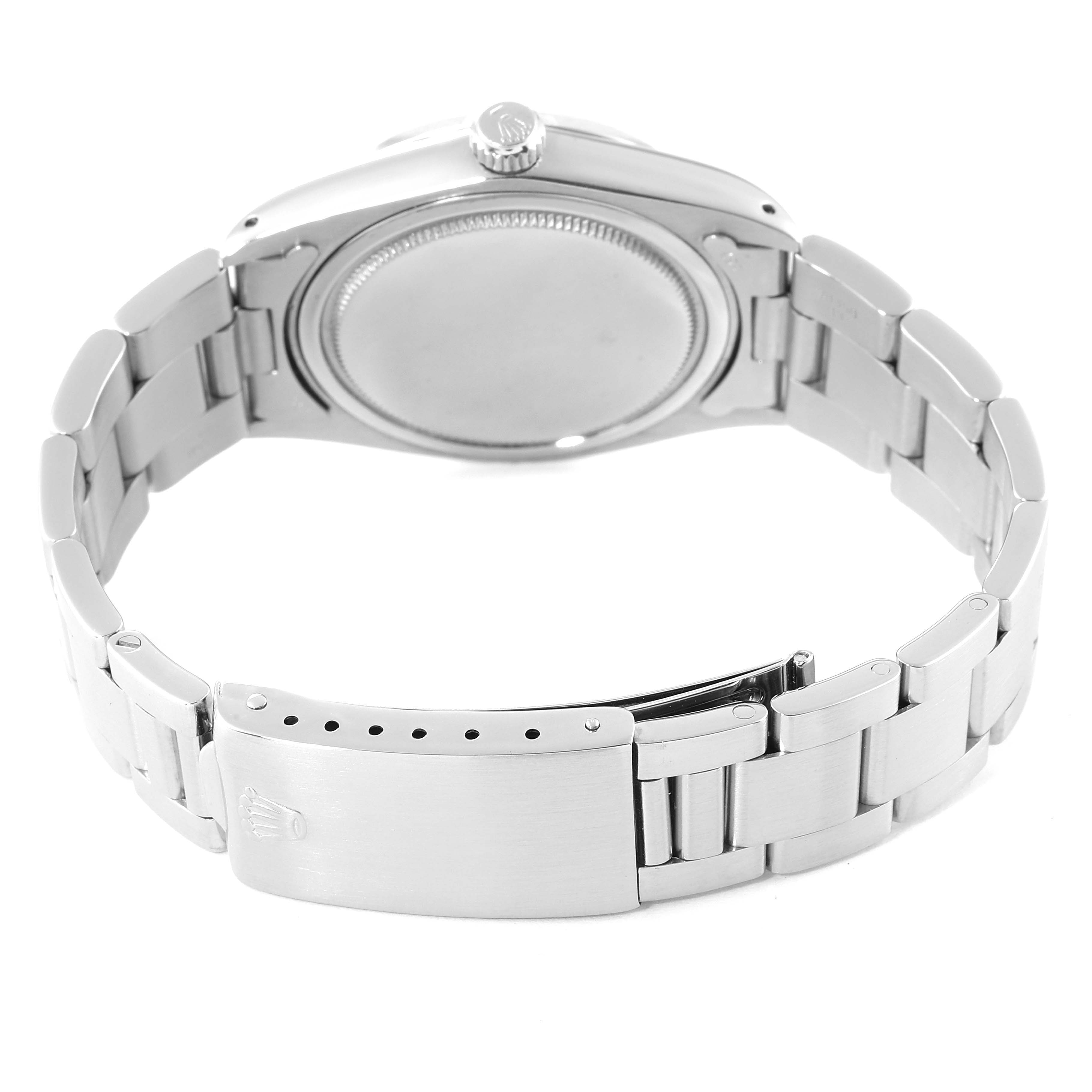 The image shows the back view of the Rolex Vintage Collection 6694 Men's Stainless Steel Black Dial 6694 Men's Stainless Steel Black Dial watch, highlighting the case back and the bracelet with the clasp.