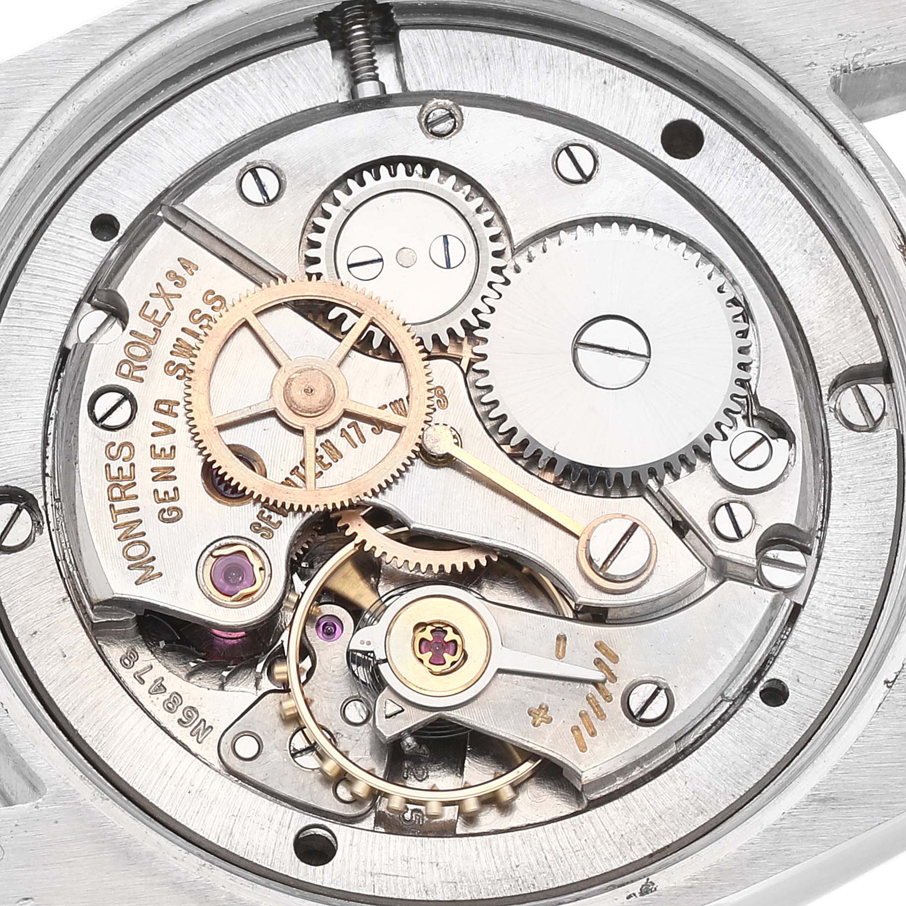 The image shows a close-up view of the inner mechanical movement of the Rolex Vintage Collection 6694 Men's Stainless Steel Black Dial 6694 Men's Stainless Steel Black Dial watch.