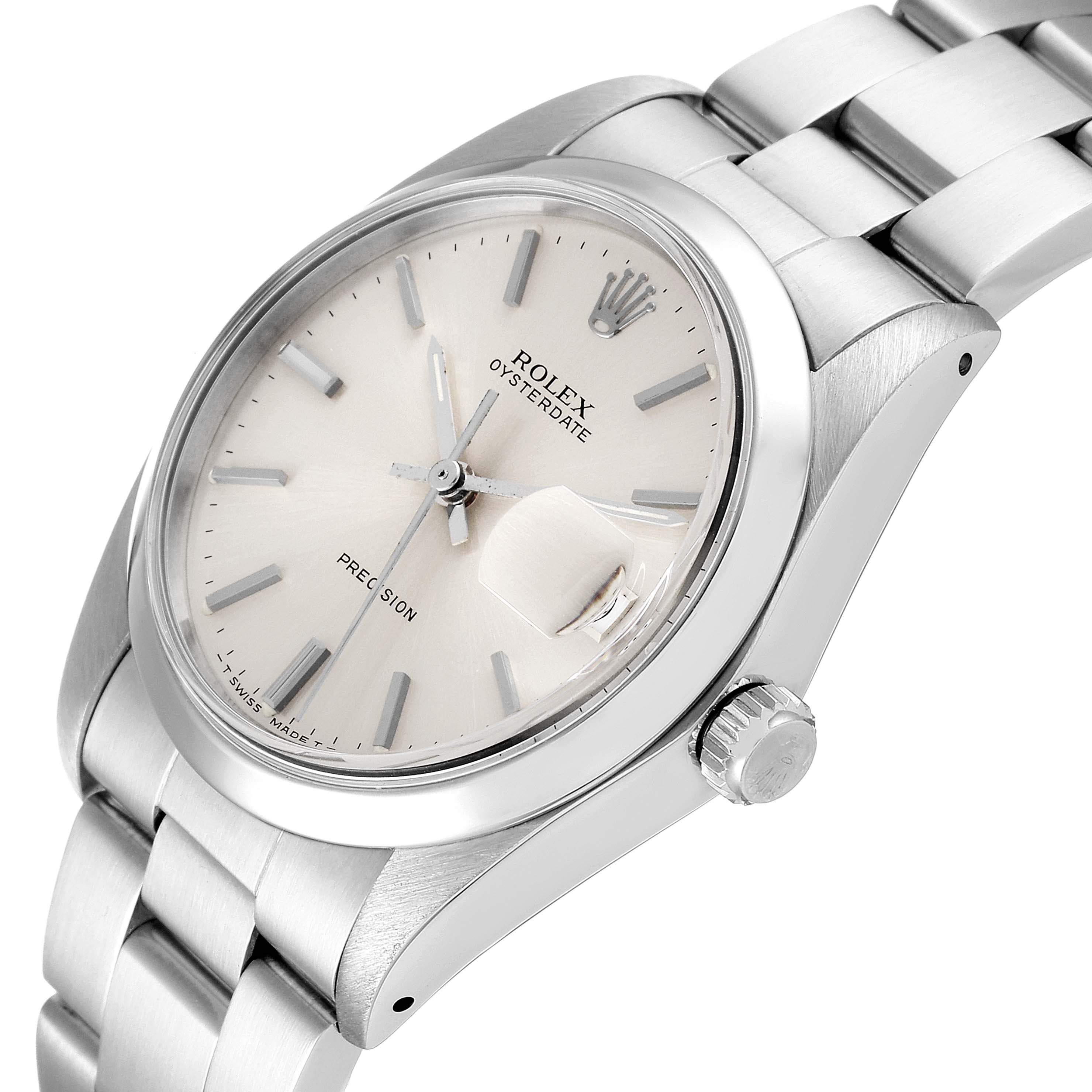 The Vintage Collection Rolex watch is shown at a slight angle highlighting its dial, date window, crown, and metal strap.
