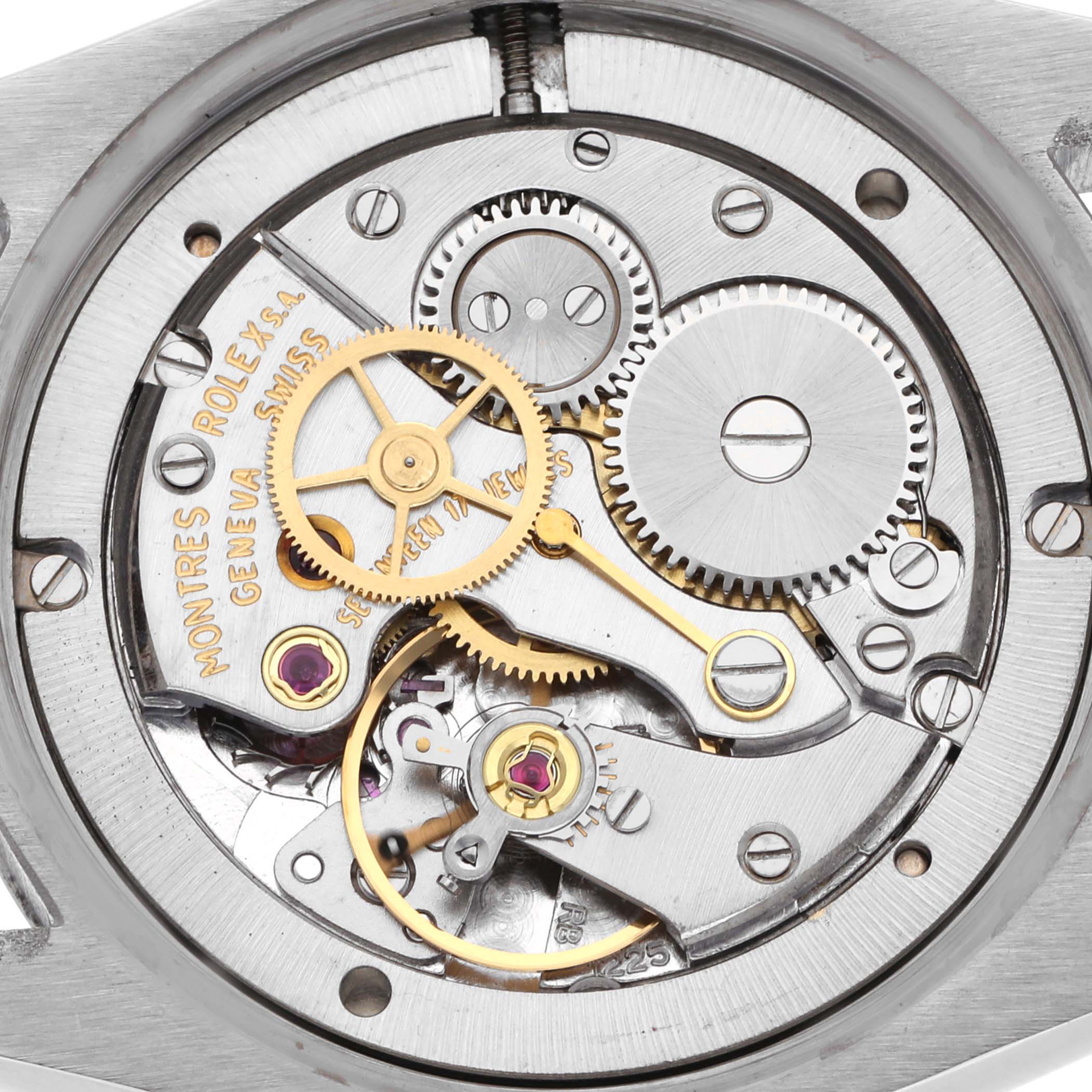 The image shows the internal mechanism of a Vintage Collection Rolex watch from a top-down angle.