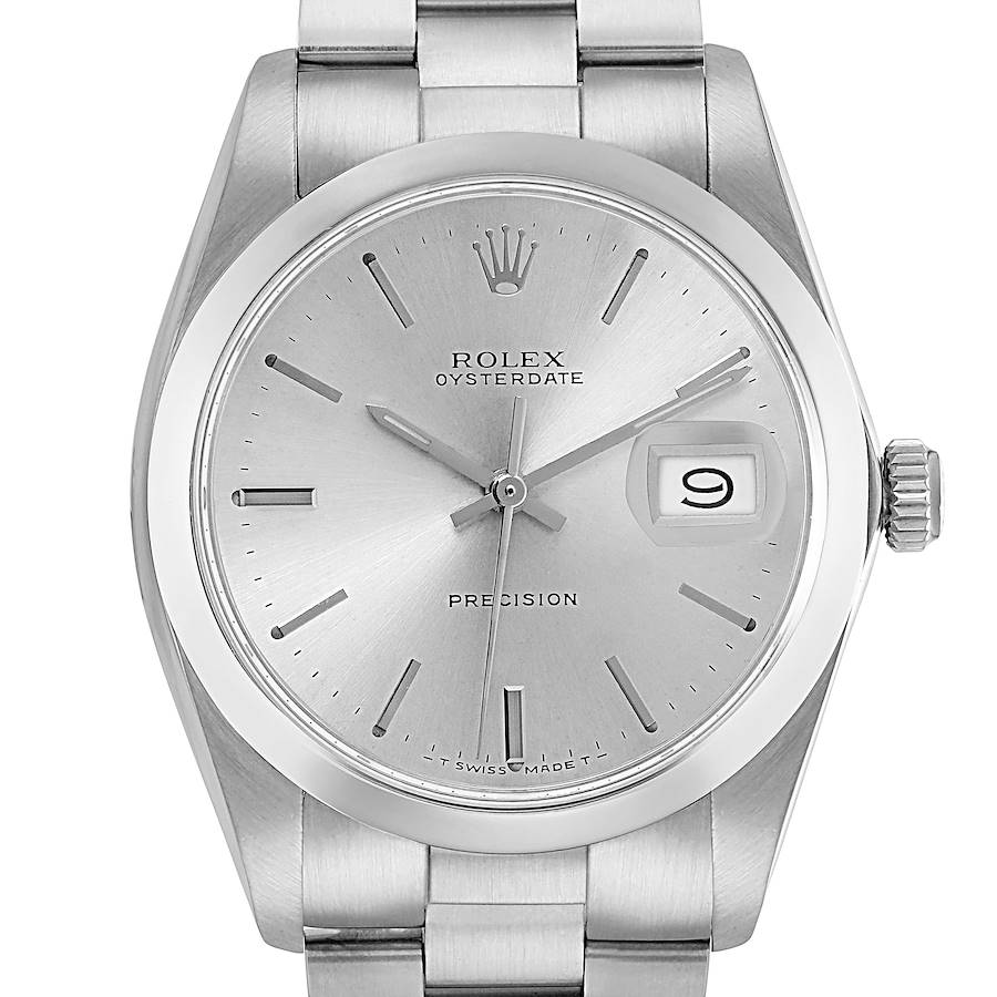 The Rolex Vintage Collection model is shown from the front, displaying the full face and part of the bracelet.