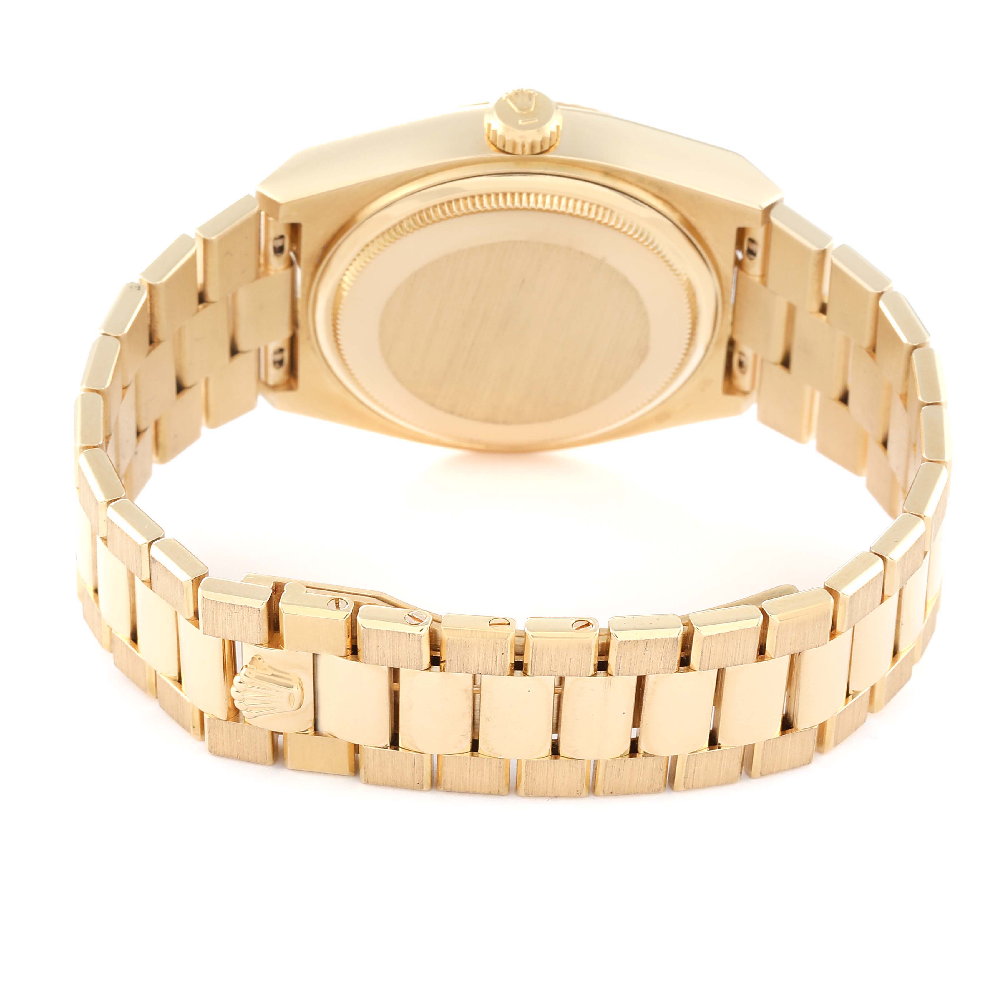 The image shows the back case and clasp of the Rolex Oysterquartz 19018 Men's Yellow Gold Champagne Dial 19018 Men's Yellow Gold Champagne Dial watch, viewed from a rear angle.