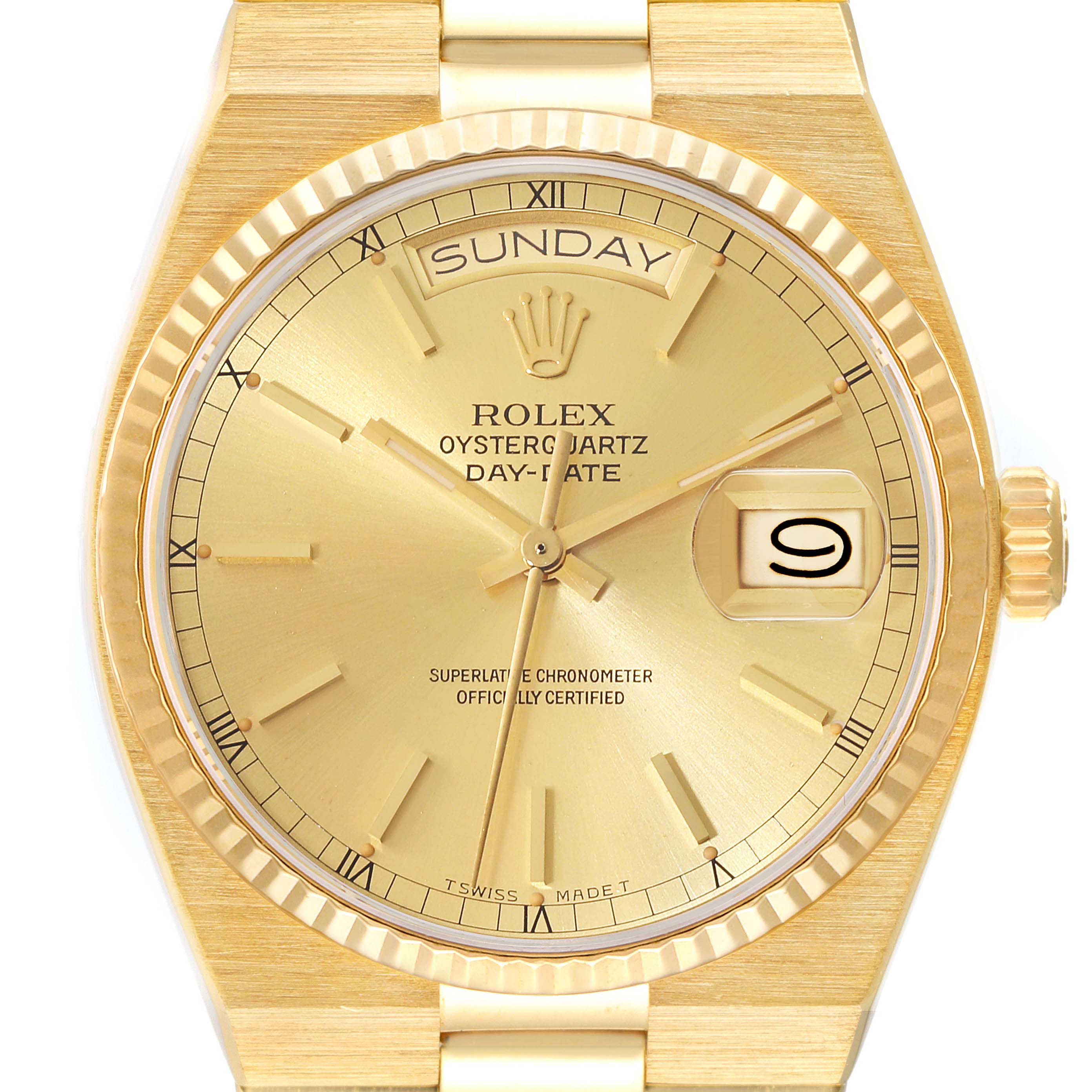 The Rolex Oysterquartz 19018 Men's Yellow Gold Champagne Dial 19018 Men's Yellow Gold Champagne Dial watch is shown from a front angle, displaying the dial, day-date window, and watch band.
