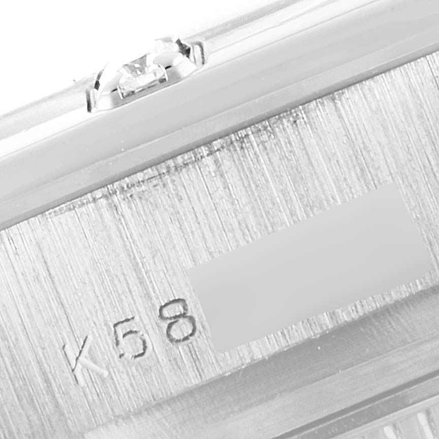 The image shows a close-up angle of the Rolex Pearlmaster 80319 Women's White Gold Mother of Pearl Dial 80319 Women's White Gold Mother of Pearl Dial watch, focusing on the engraved serial number area.