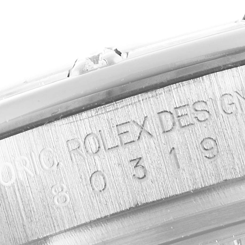 This image focuses on the side engraving of the Pearlmaster model by Rolex, showing serial numbers and design engraving.