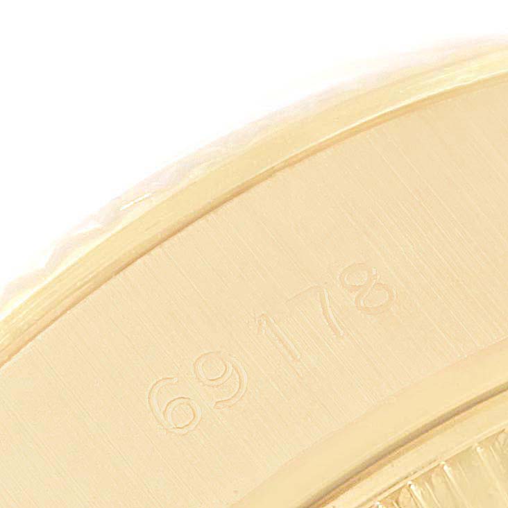 This close-up shows the side of the case with model number 69178 of the Rolex President 69178 Women
s Yellow Gold Champagne Dial 69178 Women
s Yellow Gold Champagne Dial watch.