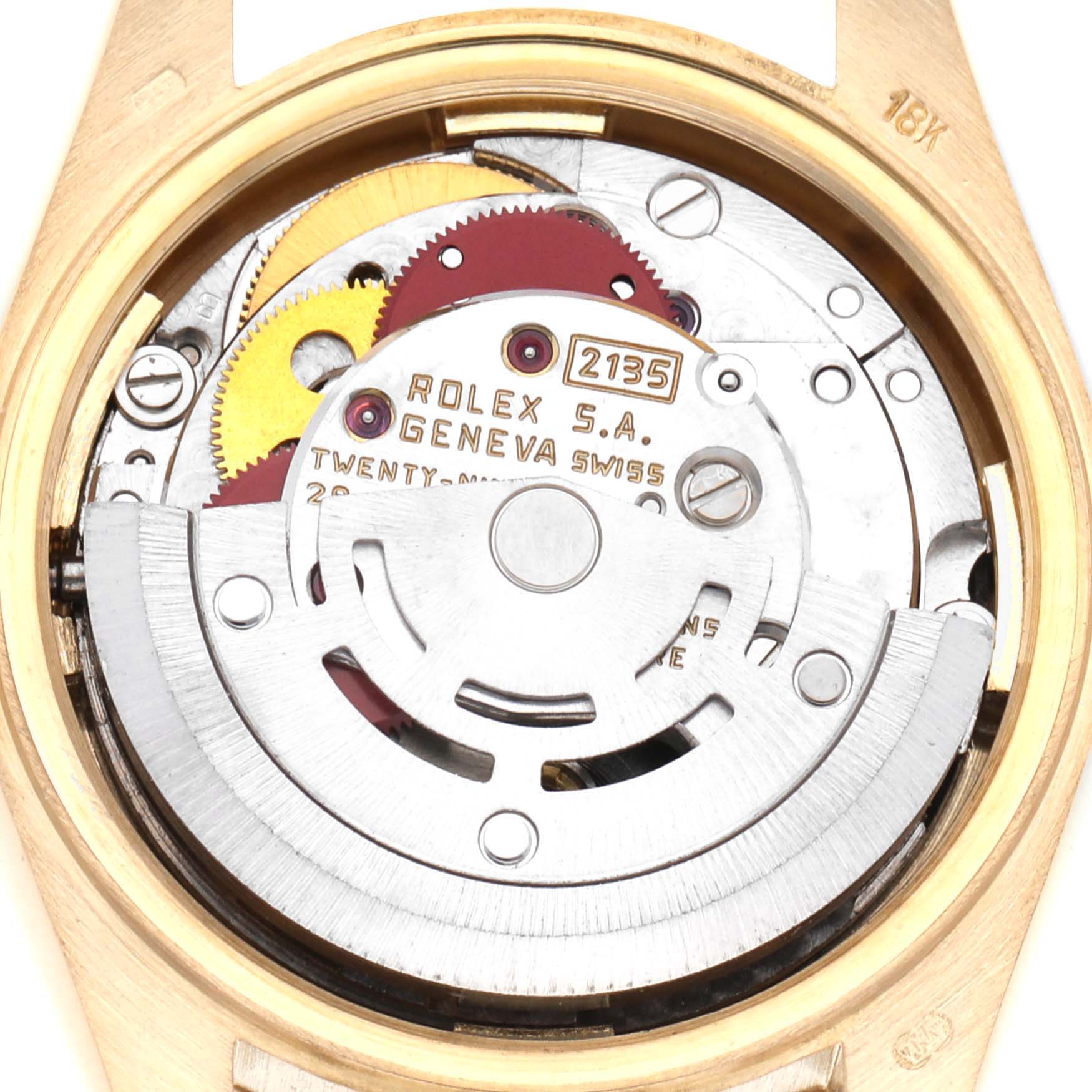 The image shows the inner workings of a Rolex President 69178 Women
s Yellow Gold Champagne Dial 69178 Women
s Yellow Gold Champagne Dial watch from a back angle, highlighting gears and the rotor.