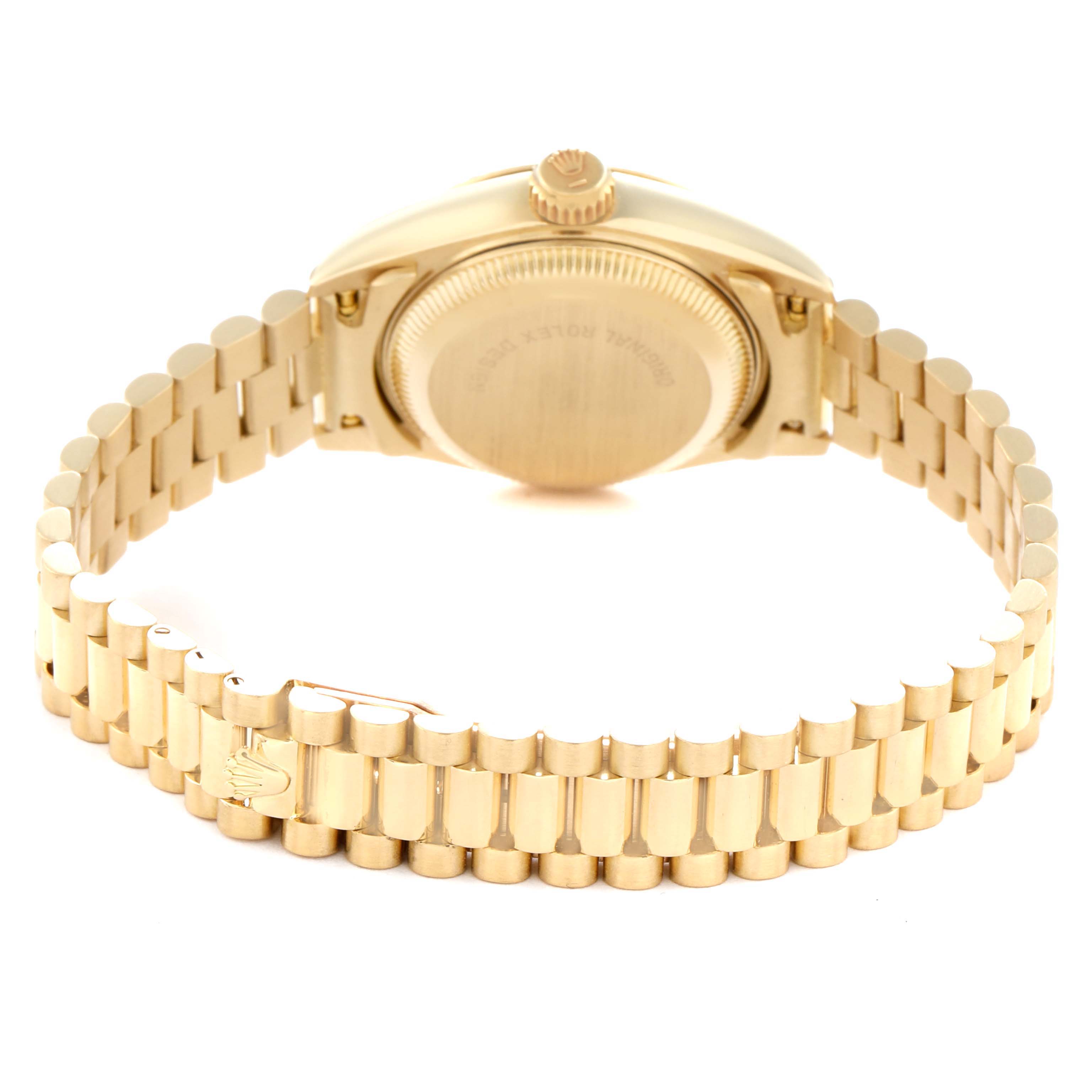 The watch is a Rolex President 69178 Women
s Yellow Gold Champagne Dial 69178 Women
s Yellow Gold Champagne Dial model shown from the back, highlighting the case back, crown, and President bracelet.