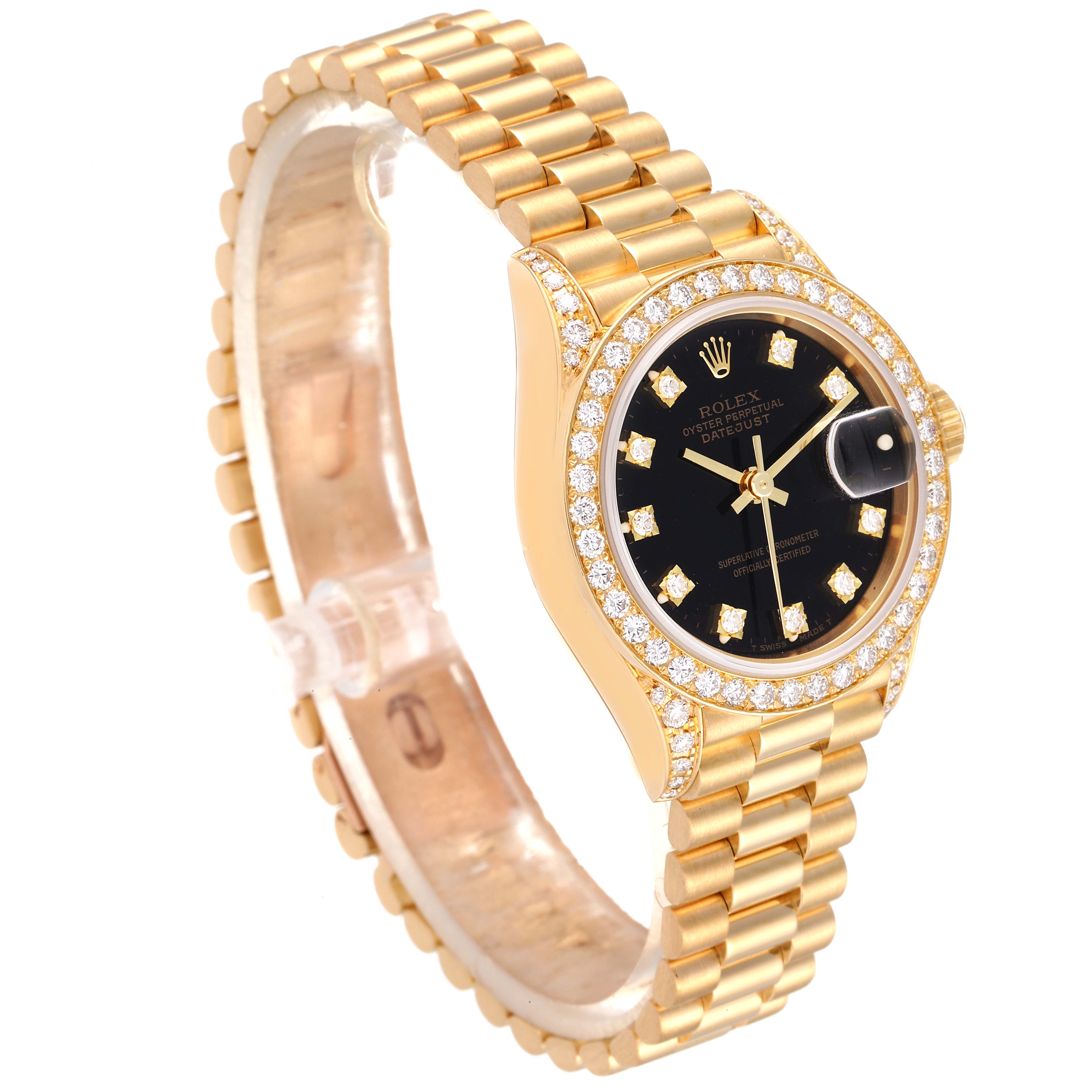 The image shows a Rolex President 69158 Women's Yellow Gold Black Dial 69158 Women's Yellow Gold Black Dial model watch at an angled view highlighting the black dial, diamond markers, and gold bracelet.