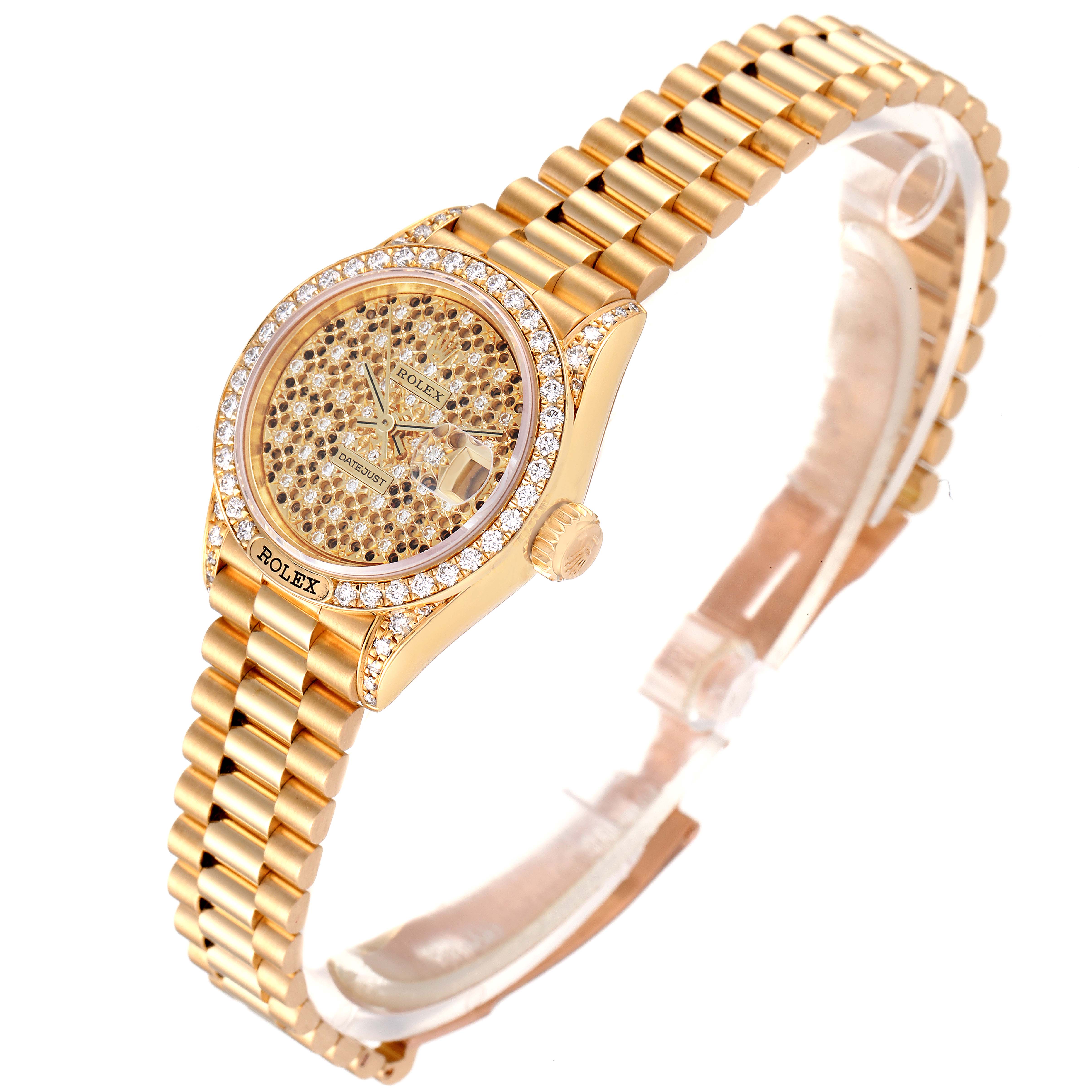 This image shows a Rolex President 69158 Women's Yellow Gold Champagne Dial 69158 Women's Yellow Gold Champagne Dial model watch at a slight diagonal angle, displaying its yellow gold bracelet, diamond bezel, and champagne diamond dial.