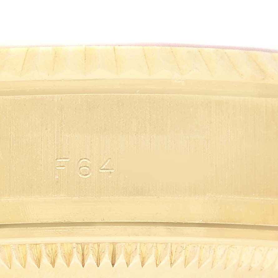 The image shows the side view of a Rolex President 179178 Women's Yellow Gold Mother of Pearl Dial model, highlighting the bezel and engraved markings.