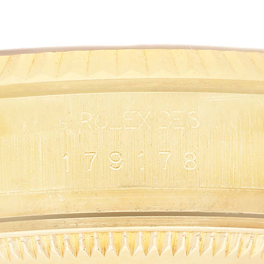 The image shows a close-up of the side and serial number engraving on a Rolex President 179178 Women's Yellow Gold Mother of Pearl Dial model.