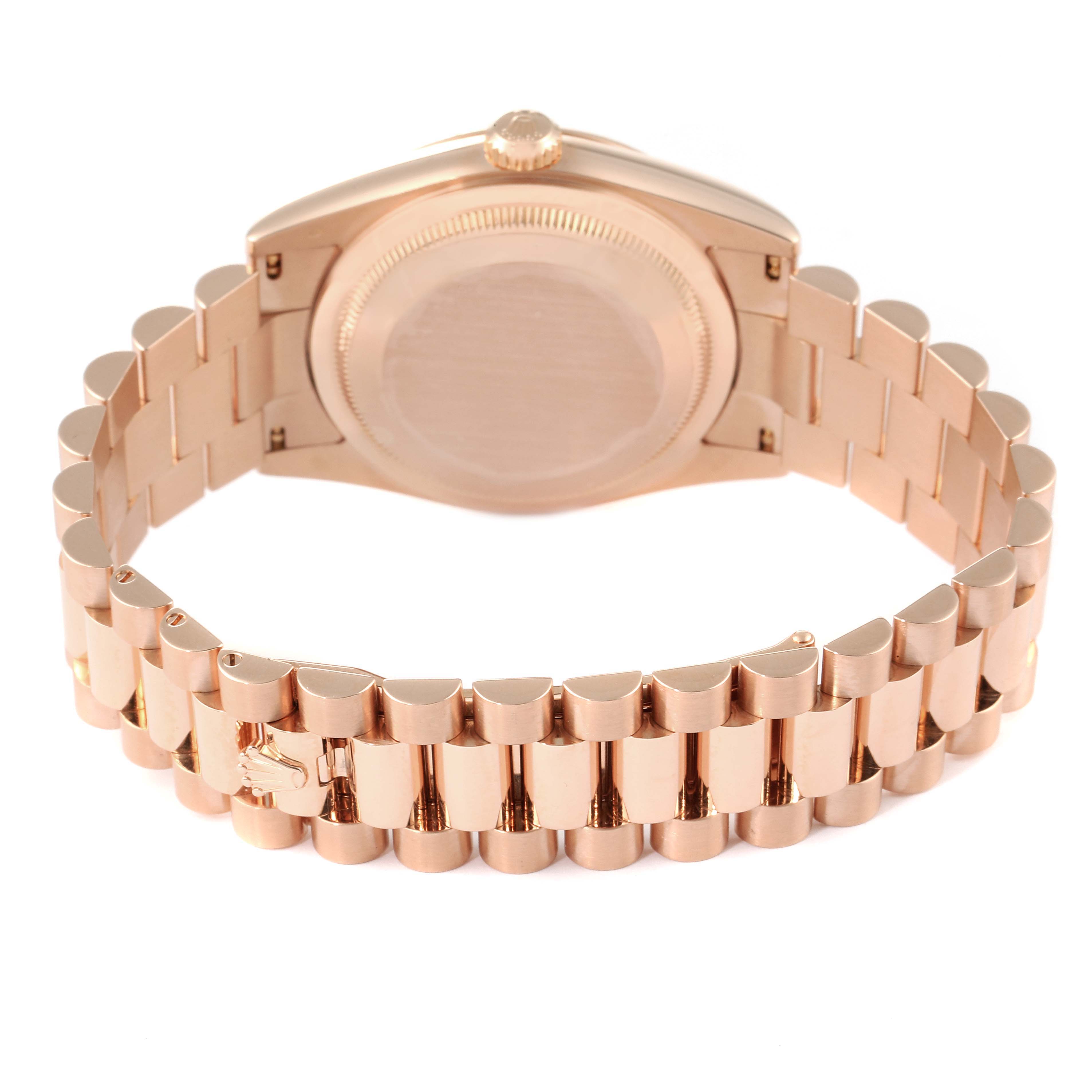 This image shows the back and bracelet of a Rolex President 118235 Men's Rose Gold Pink Dial 118235 Men's Rose Gold Pink Dial model watch.