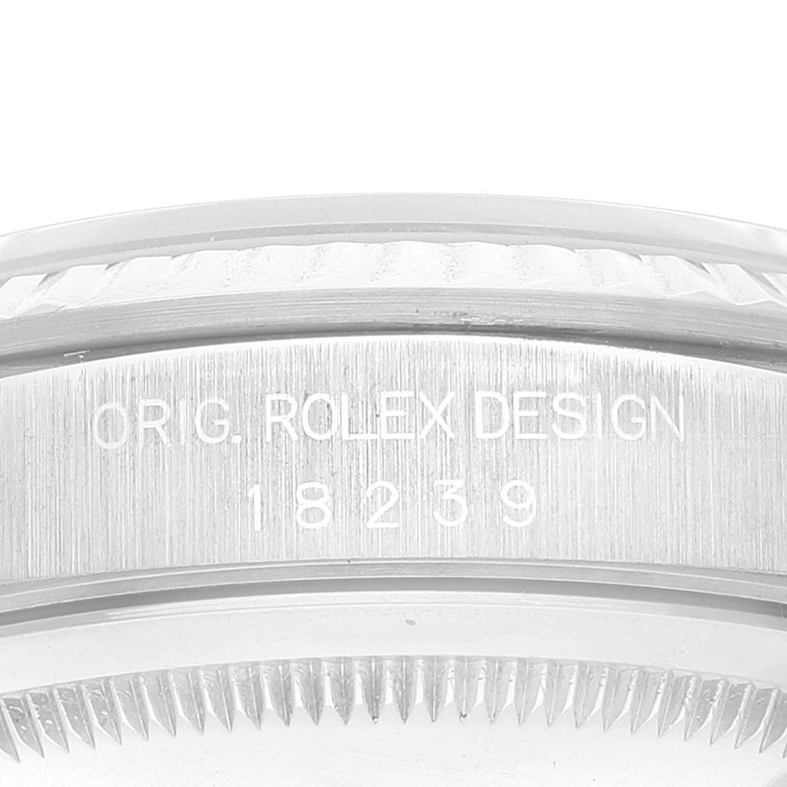This is a close-up angle showing the engraved details on the case side of a Rolex President 18239 Men's White Gold Silver Dial 18239 Men's White Gold Silver Dial model.