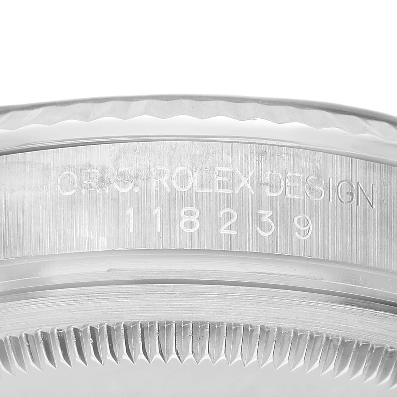 The image shows a close-up of the side of the Rolex President 118239 Men's White Gold Silver Dial model, highlighting the engraved model number "18239" on the watch case.