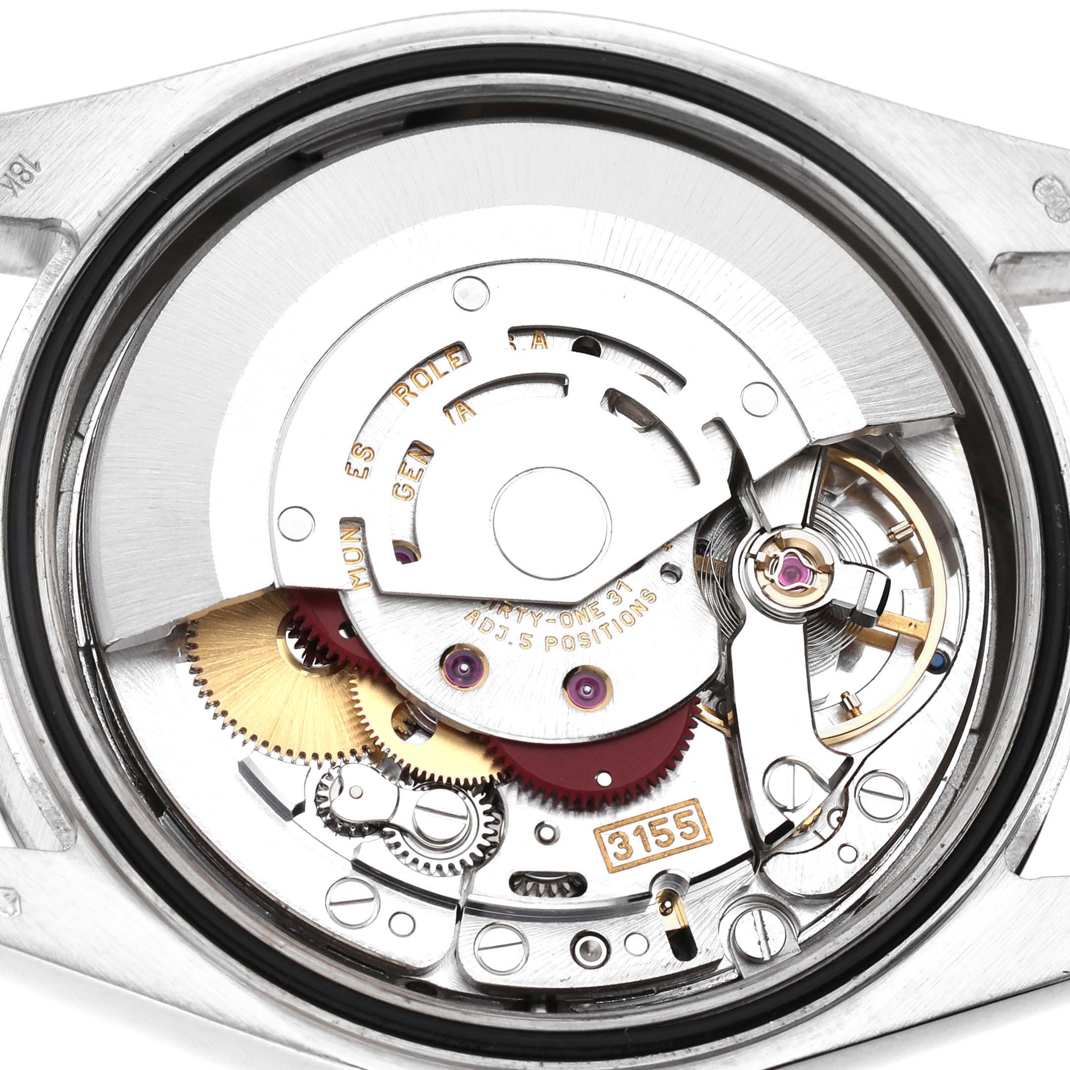 The image shows the internal mechanism of a Rolex President 118239 Men's White Gold Silver Dial model watch, focusing on the movement and gear components.