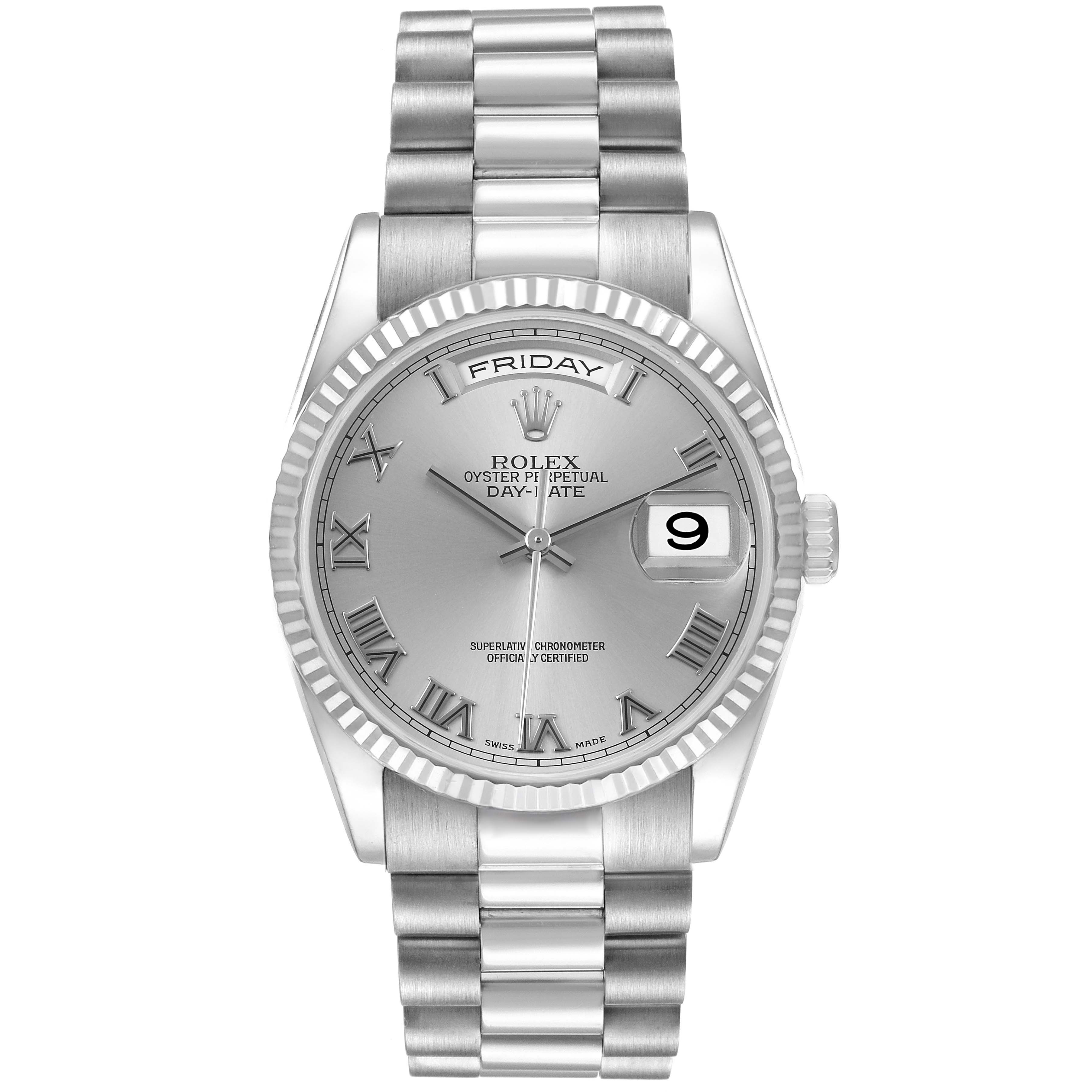 The image shows a frontal view of the Rolex President 118239 Men's White Gold Silver Dial model featuring a full bracelet, fluted bezel, and Roman numeral hour markers.