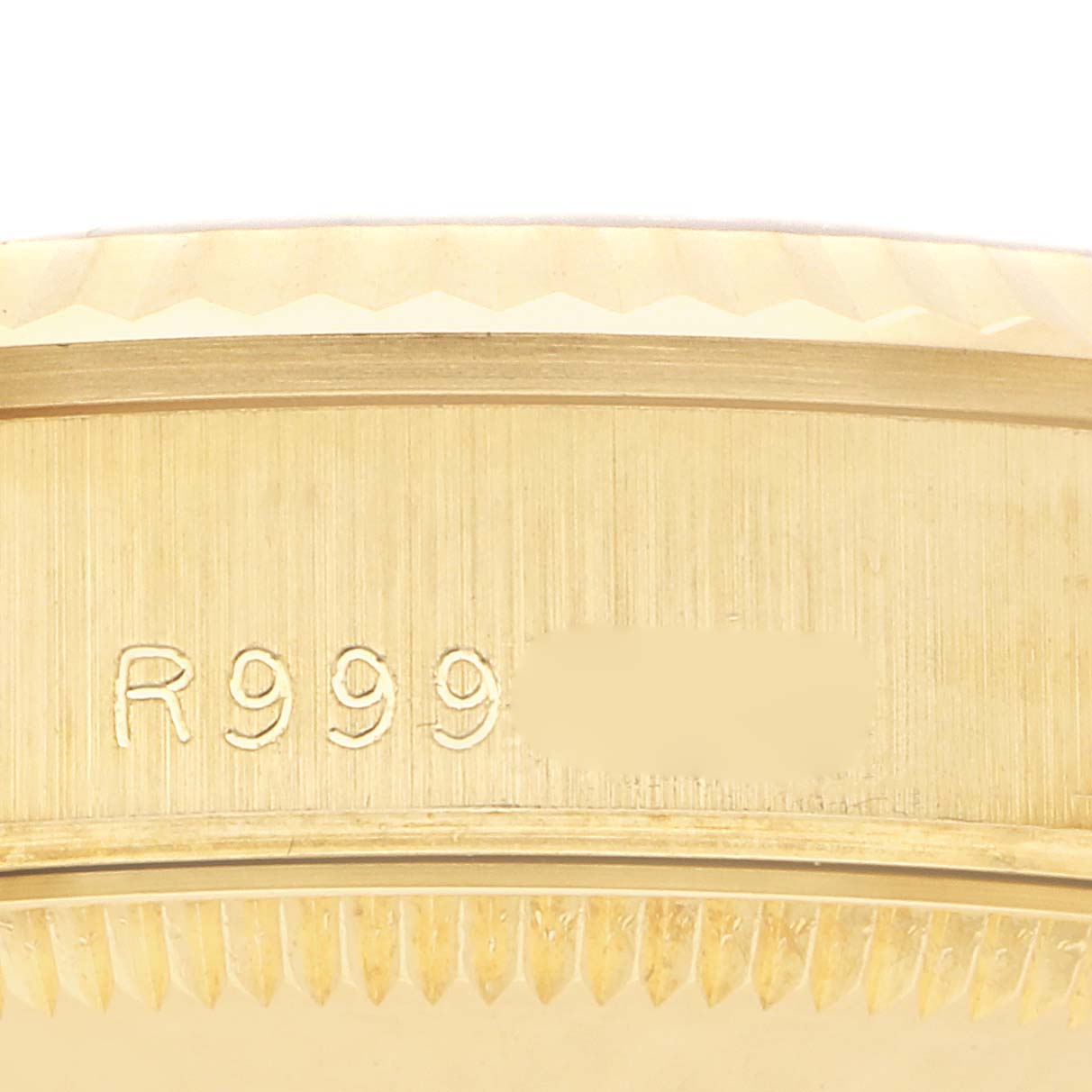 The image shows the side of the Rolex President 68278 Women's Yellow Gold Champagne Dial 68278 Women's Yellow Gold Champagne Dial model, highlighting the serial engraving on the case edge.