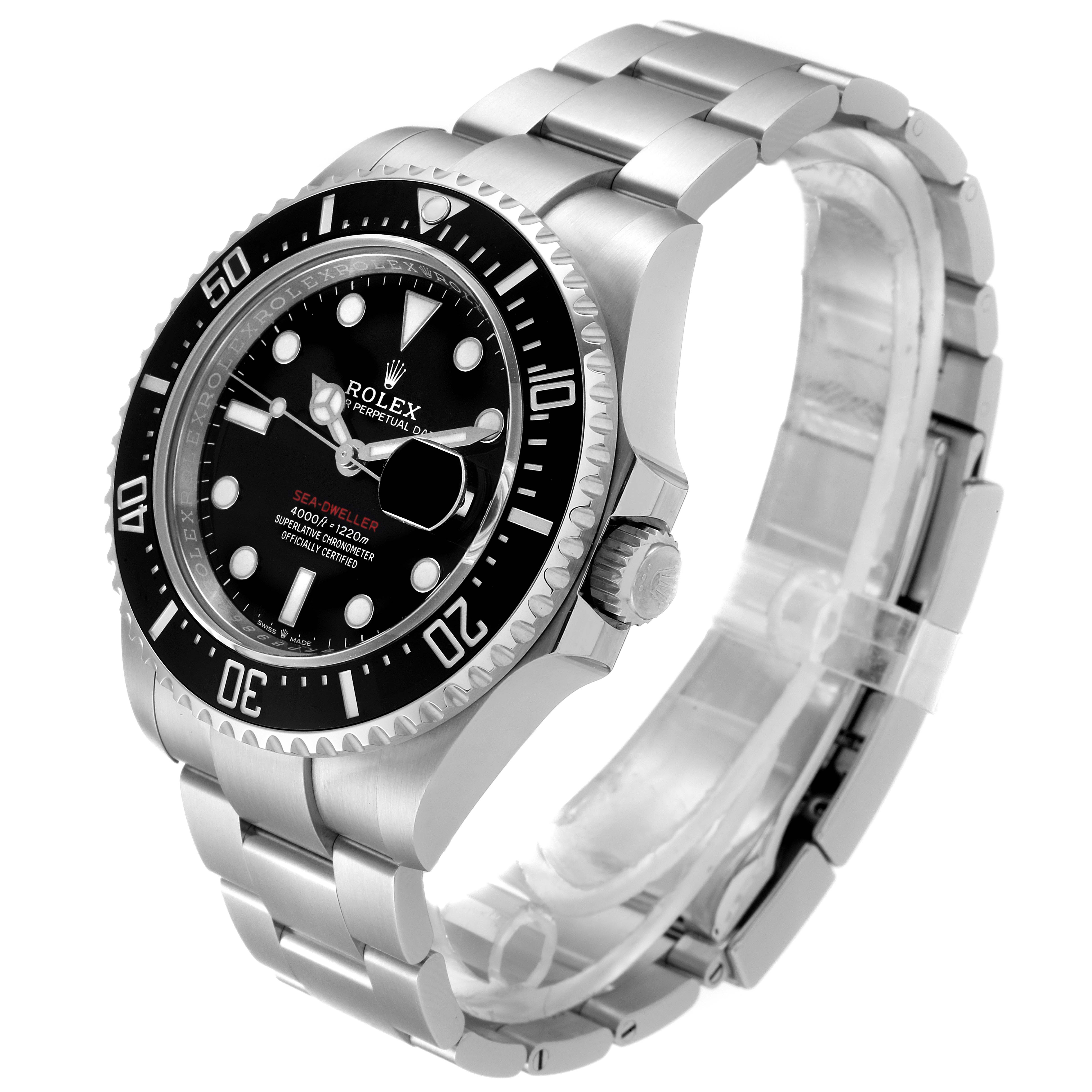 The Rolex Sea-Dweller 126600 Men
s Stainless Steel Black Dial 126600 Men
s Stainless Steel Black Dial watch is shown from a three-quarter angle, highlighting the face, bezel, crown, and metal bracelet.
