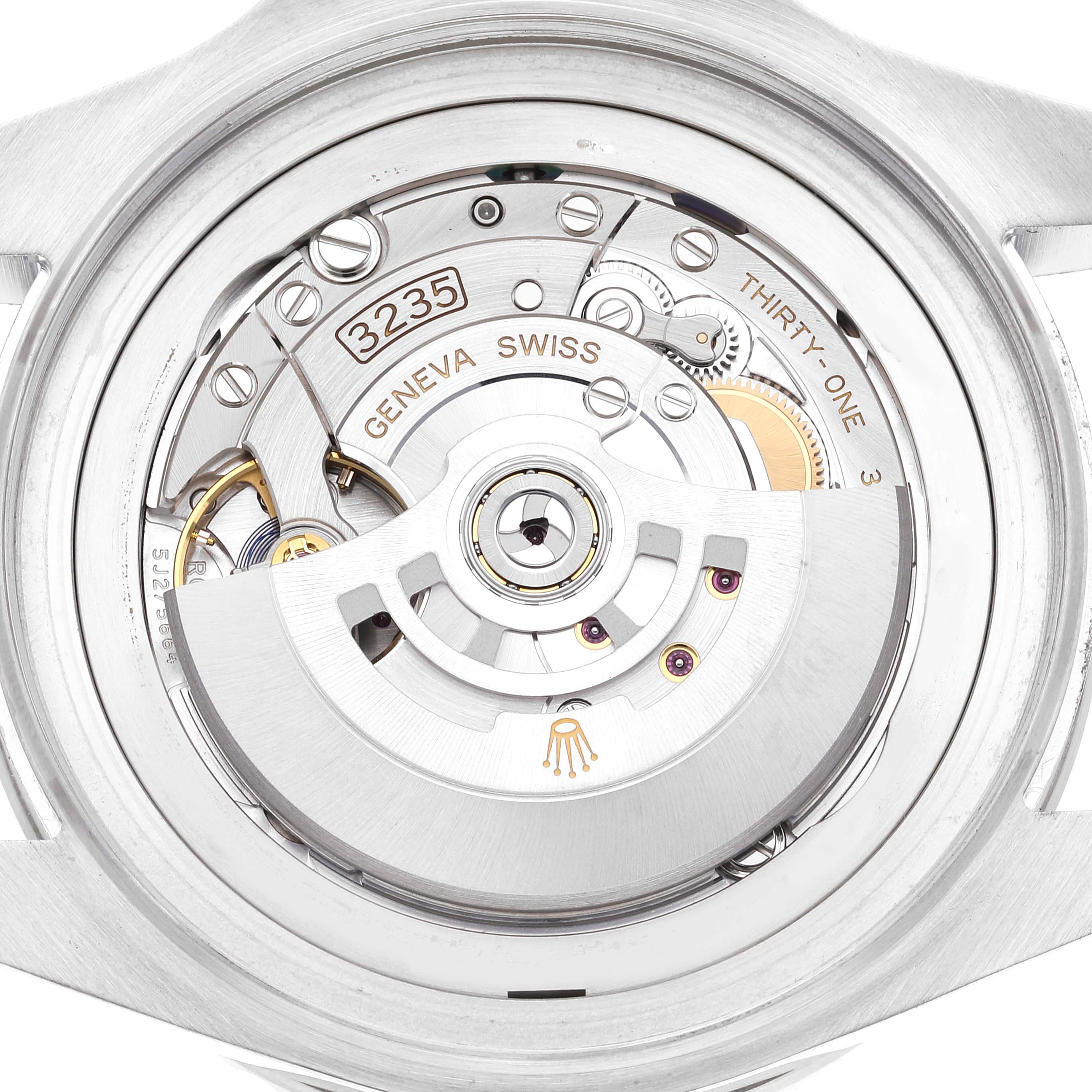 This image shows the interior mechanism of the Rolex Sea-Dweller 126660 Men's Stainless Steel Black Dial 126660 Men's Stainless Steel Black Dial watch from a bottom angle, highlighting the movement parts and engravings.