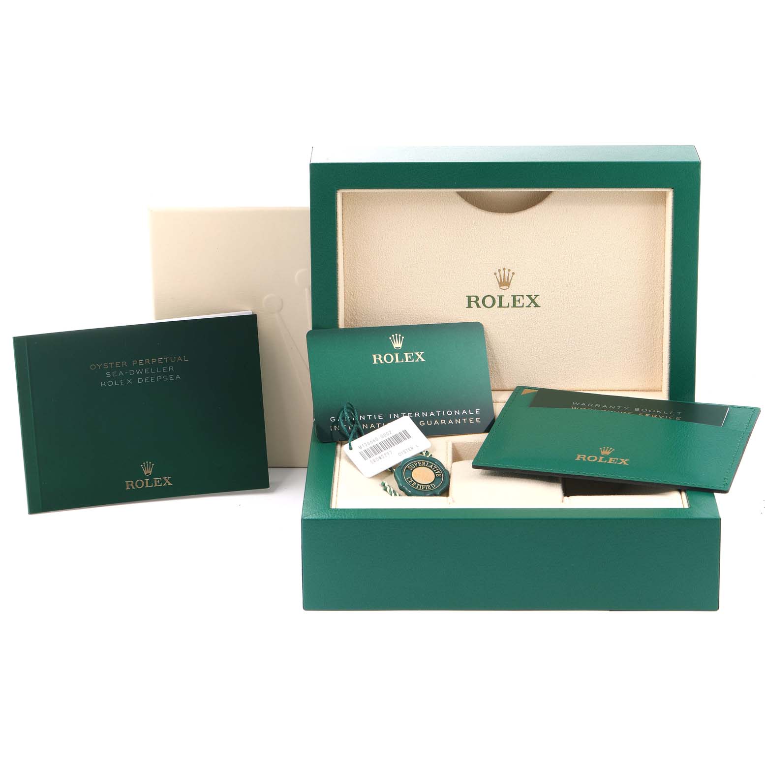 The image shows the packaging and accessories for a Rolex Sea-Dweller 126660 Men's Stainless Steel Blue Dial 126660 Men's Stainless Steel Blue Dial watch, including the box, manuals, and warranty card.